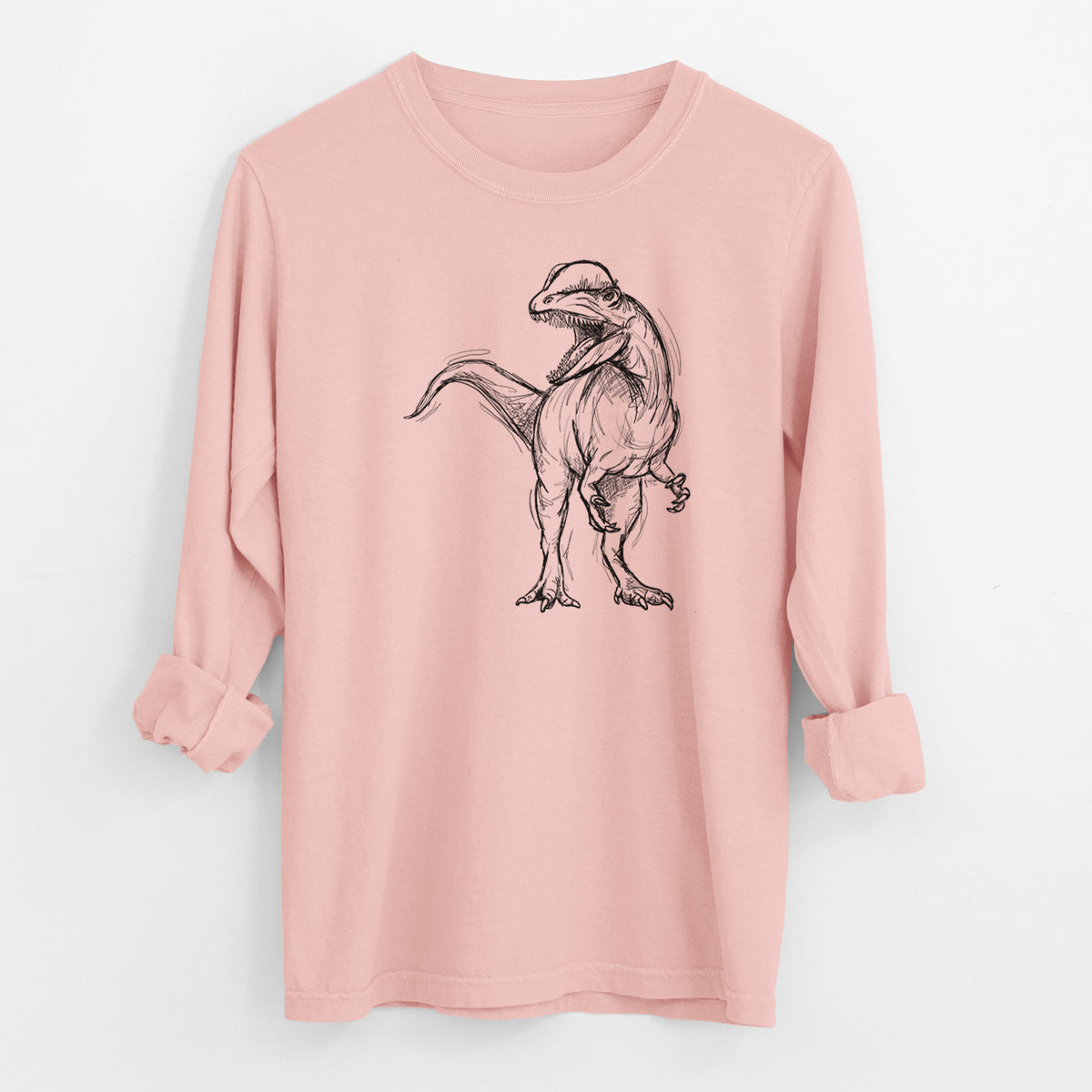 Peachy Comfort Colors long sleeve shirt laid flat with the cuffs rolled, printed with a black ink illustration of a Dilophosaurus with its neck frill, walking.