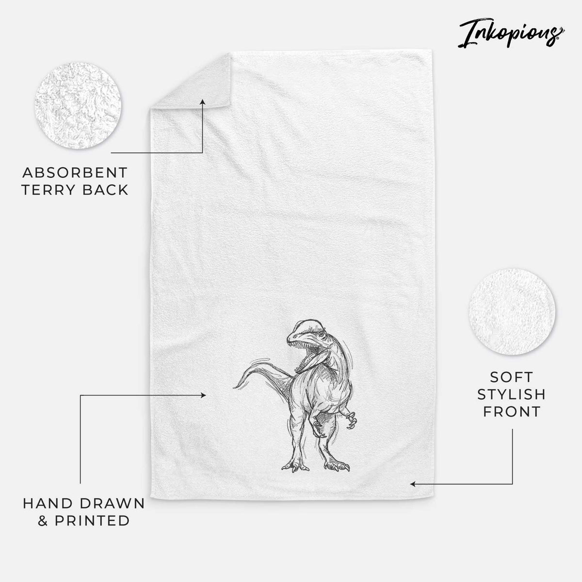 White hand towel printed with a black ink illustration of a Dilophosaurus with its neck frill, walking.