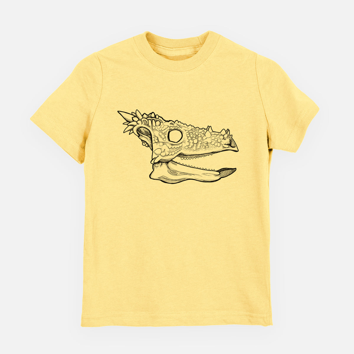 Butter yellow youth t-shirt laid flat, printed with a black ink illustration of a spiky Dracorex dinosaur skull.