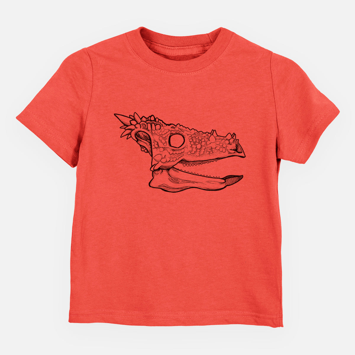 Passionfruit pink toddler t-shirt laid flat, printed with a black ink illustration of a spiky Dracorex dinosaur skull.