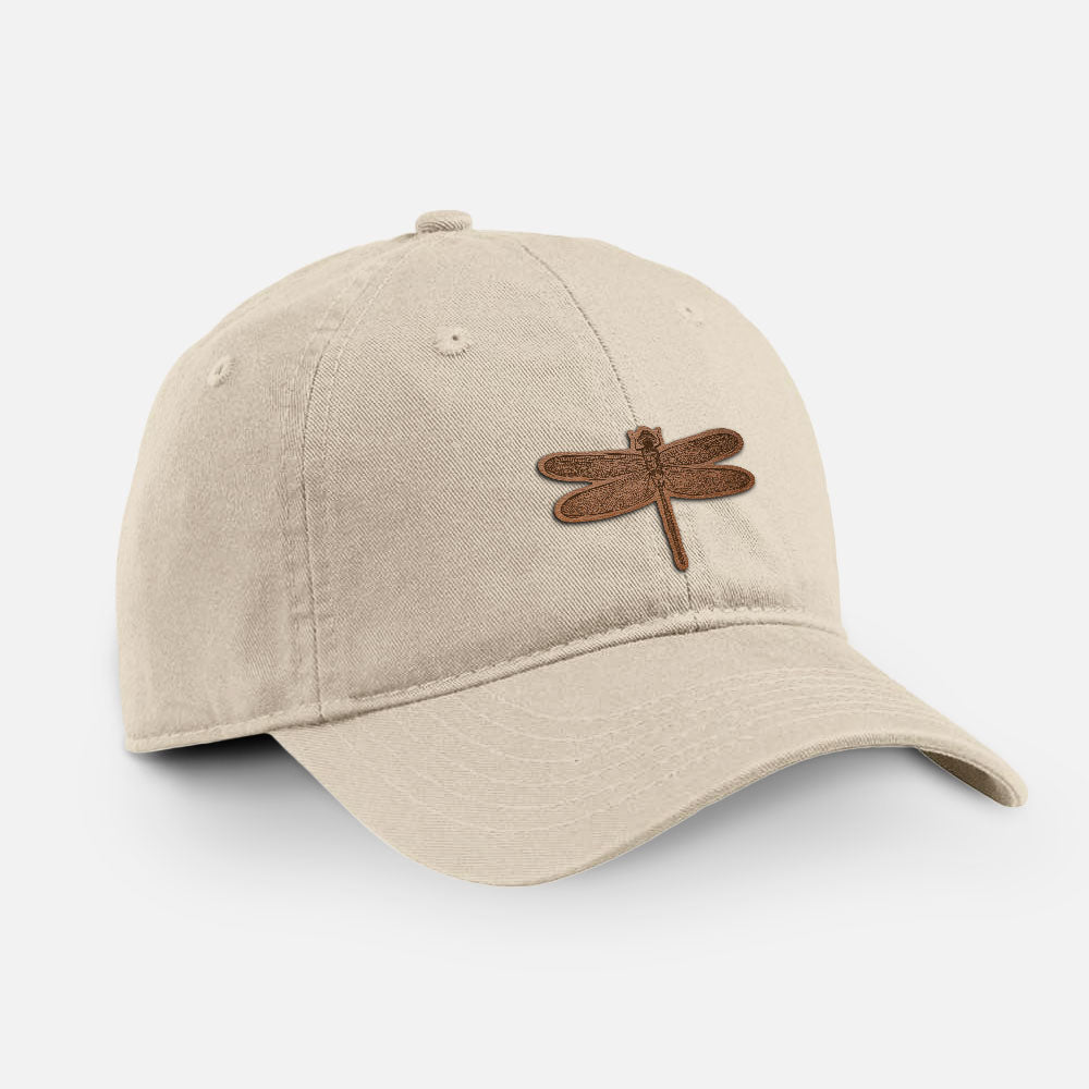 Stone cotton baseball hat with a detailed engraving of a dragonfly with patterned wings on the front.