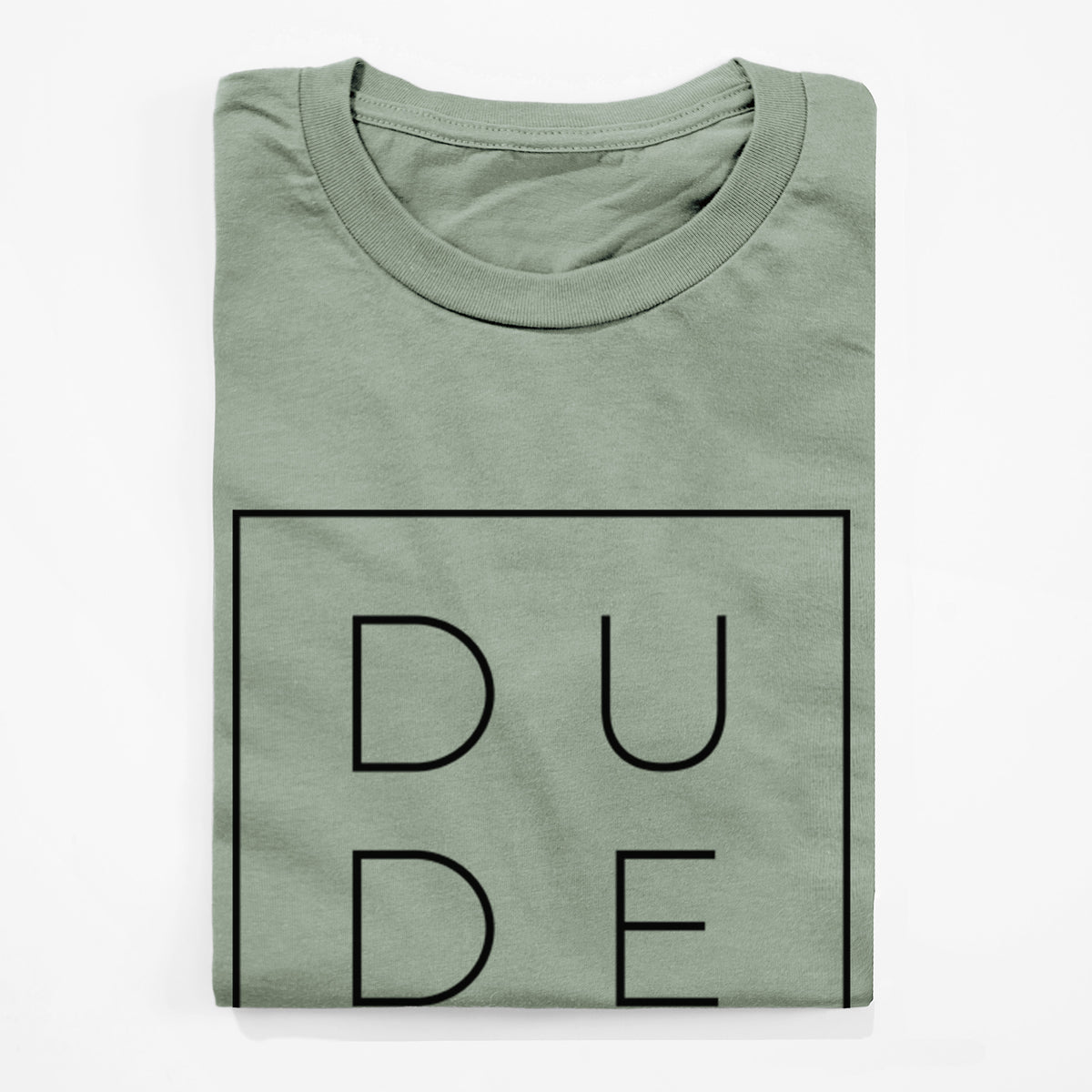 Sage green lightweight cotton t-shirt folded, showing the word DUDE in thin black letters stacked inside a square outline.