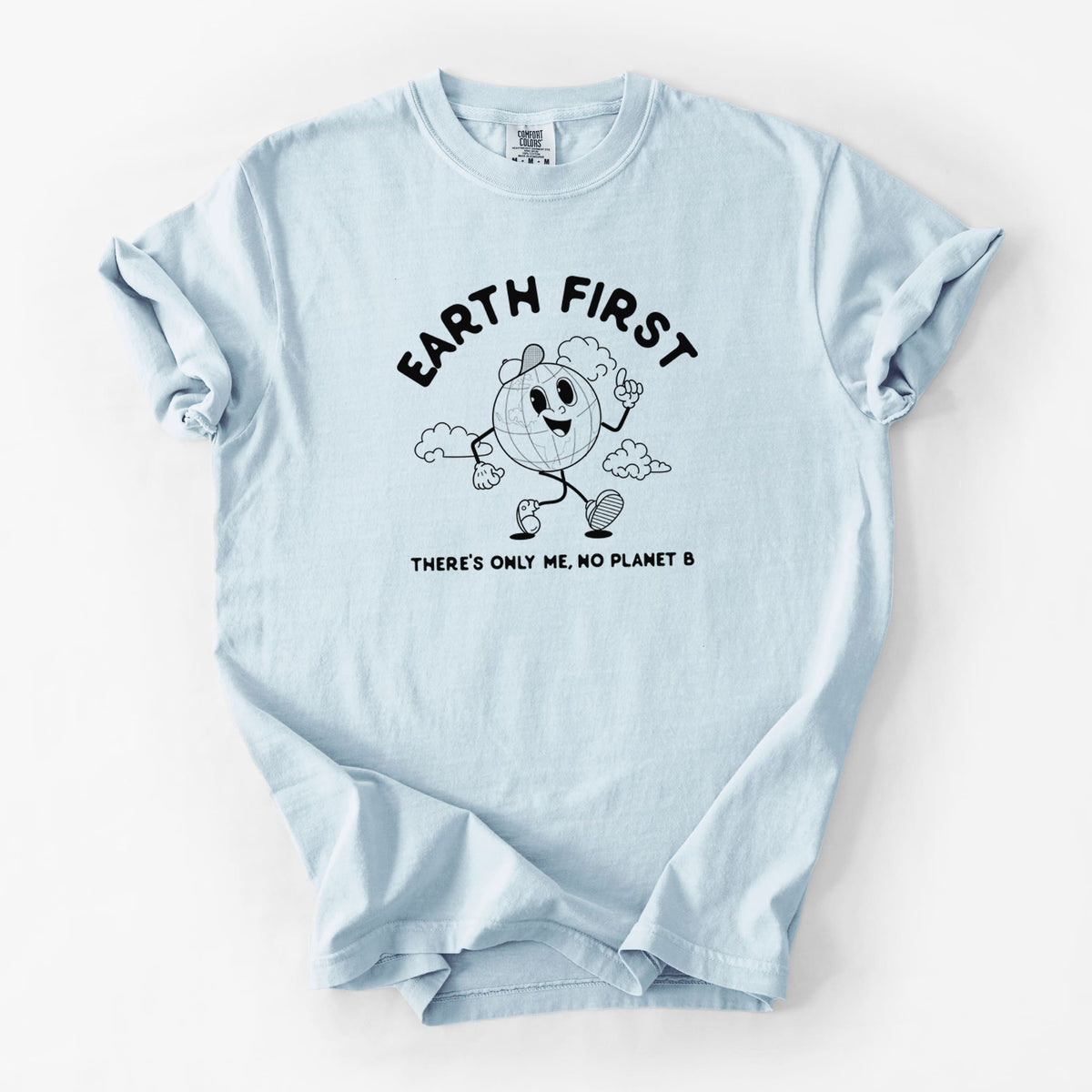 Chambray blue Comfort Colors t-shirt laid flat, printed with a cheerful cartoon Earth running, with the words Earth First and There's Only Me, No Planet B.