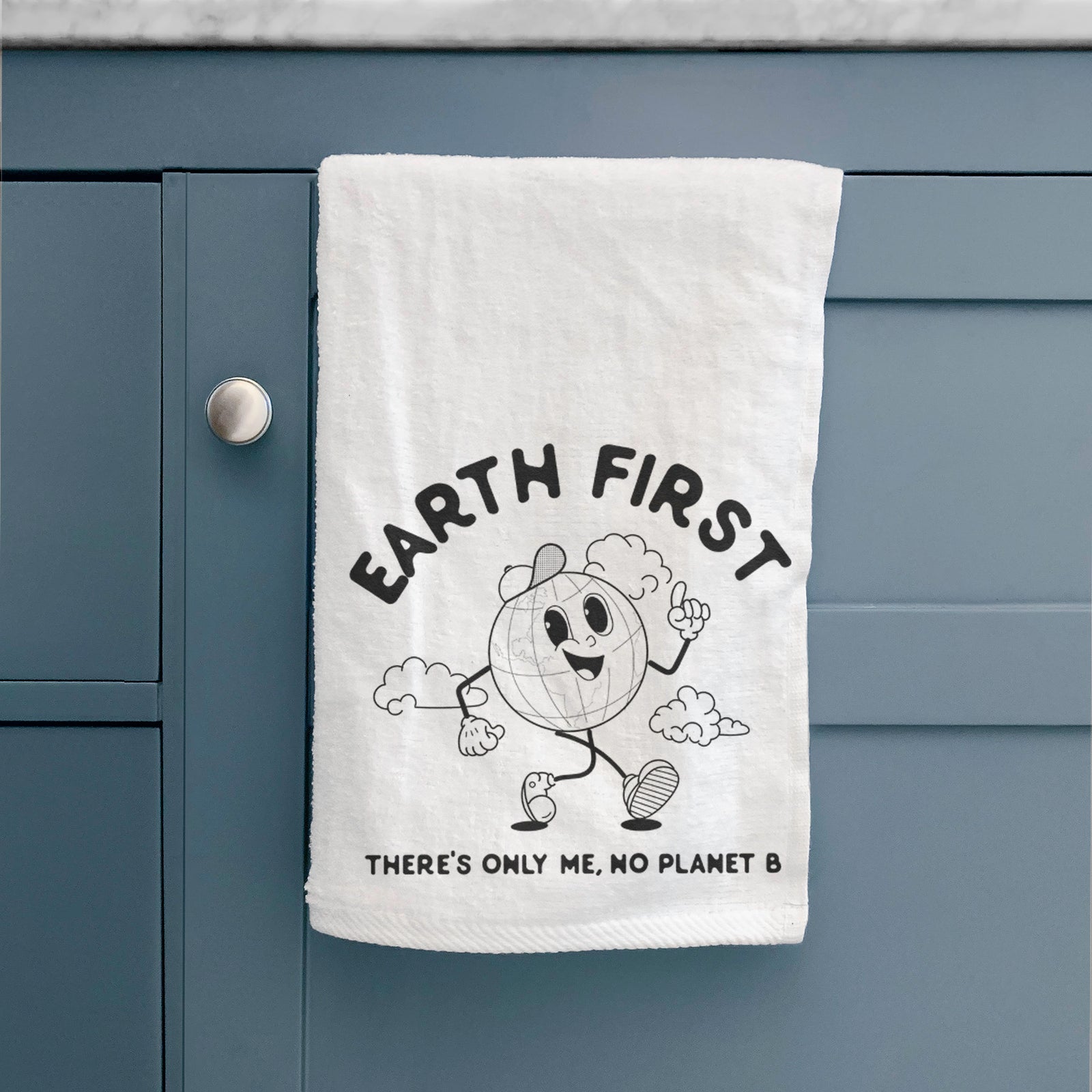 White hand towel printed with a cheerful cartoon Earth running, with the words Earth First and There's Only Me, No Planet B.