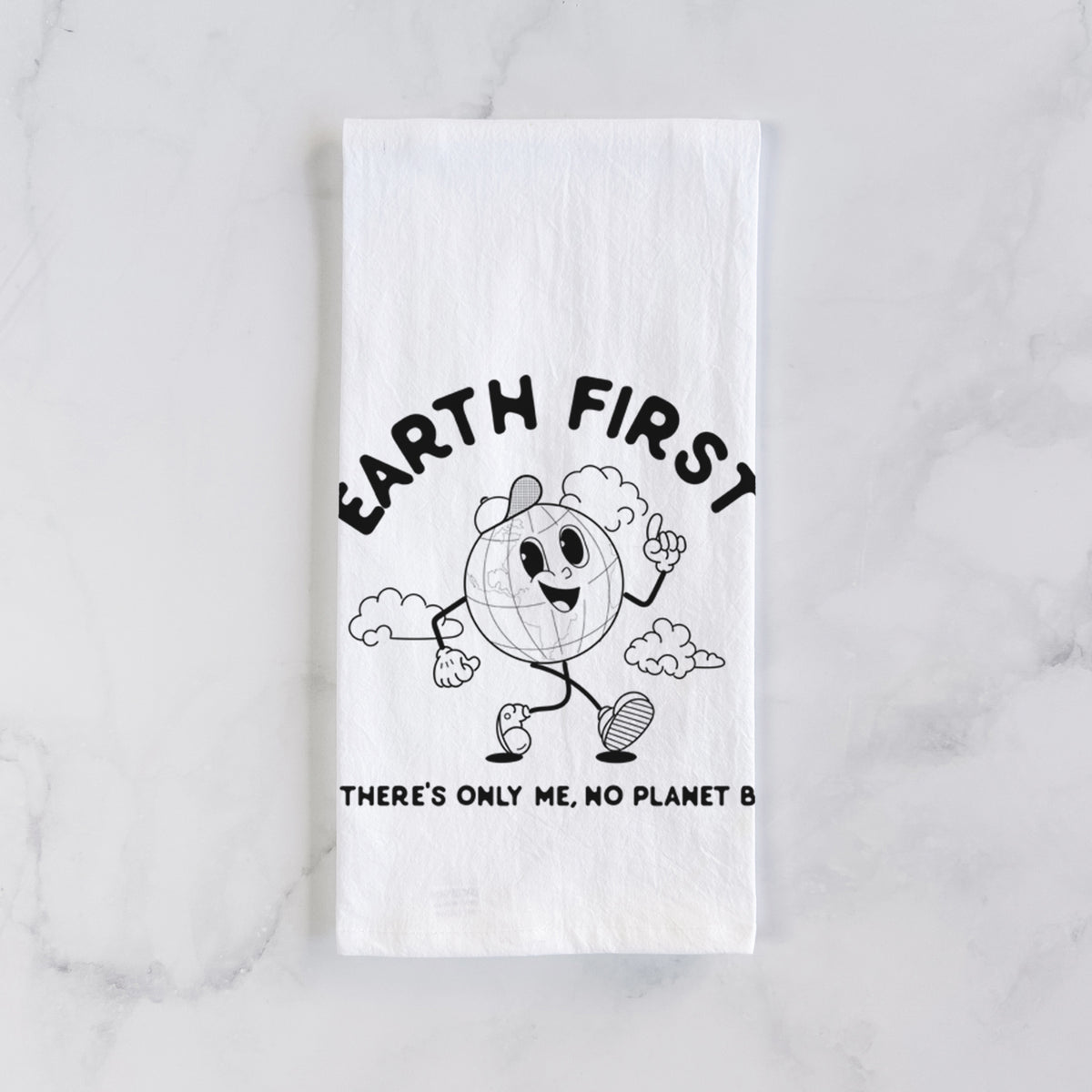 White cotton tea towel laid flat on marble, printed with a cheerful cartoon Earth running, with the words Earth First and There's Only Me, No Planet B.
