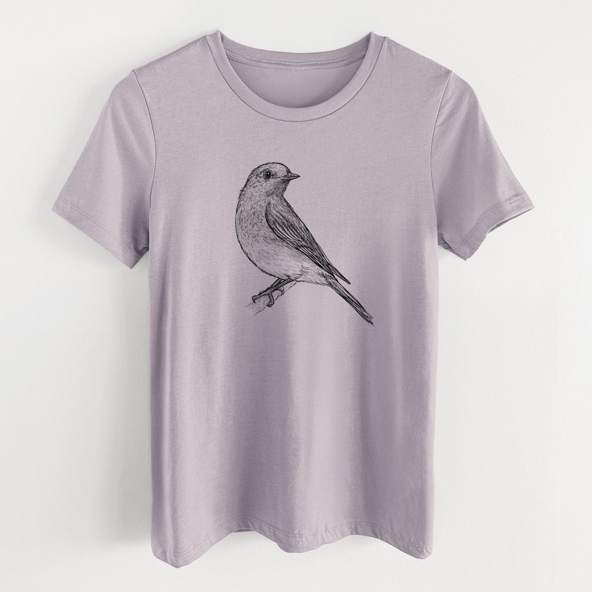 Light violet women's relaxed fit cotton t-shirt laid flat, printed with a detailed black ink sketch of an eastern bluebird perched on a branch.