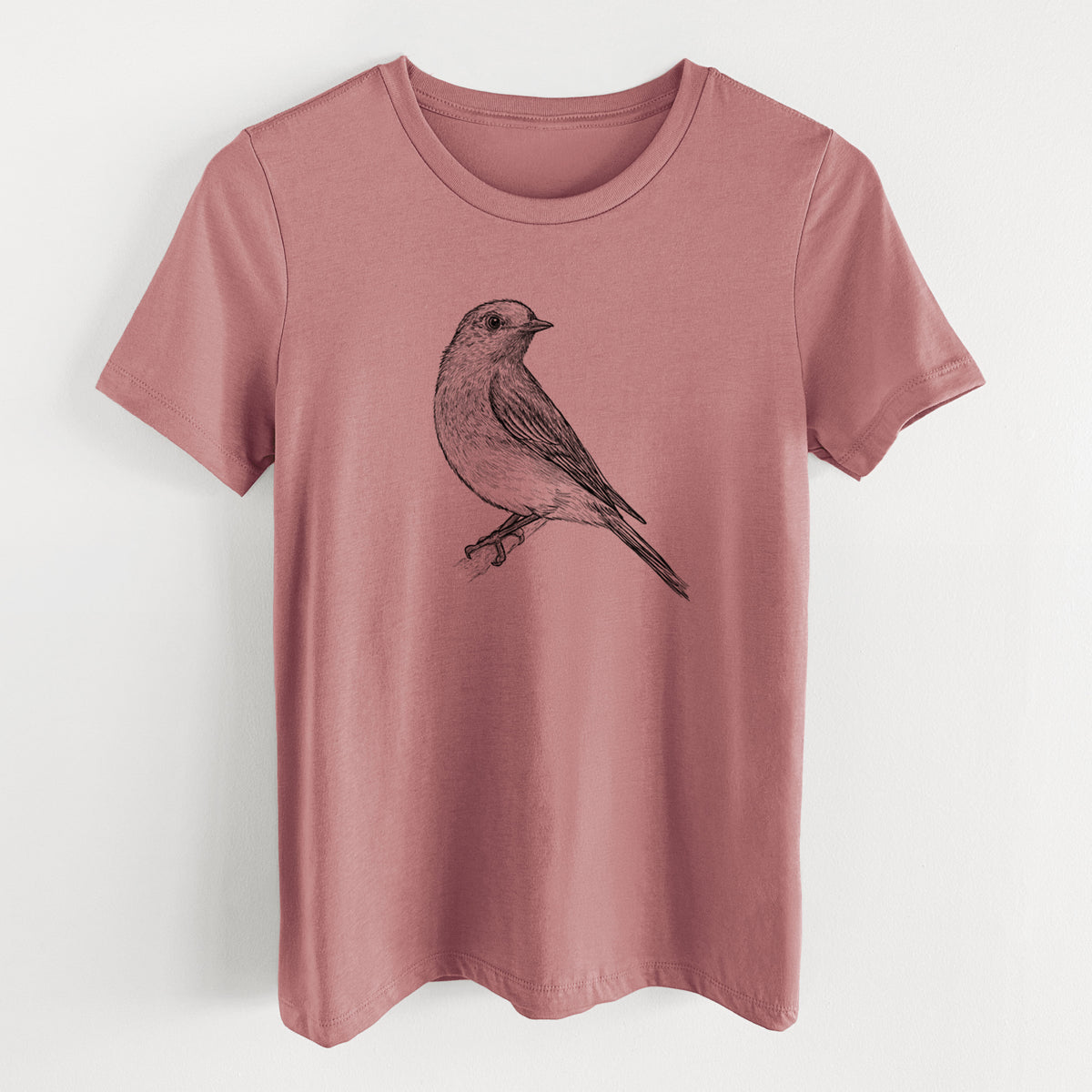 Mauve pink women's relaxed fit cotton t-shirt laid flat, printed with a detailed black ink sketch of an eastern bluebird perched on a branch.