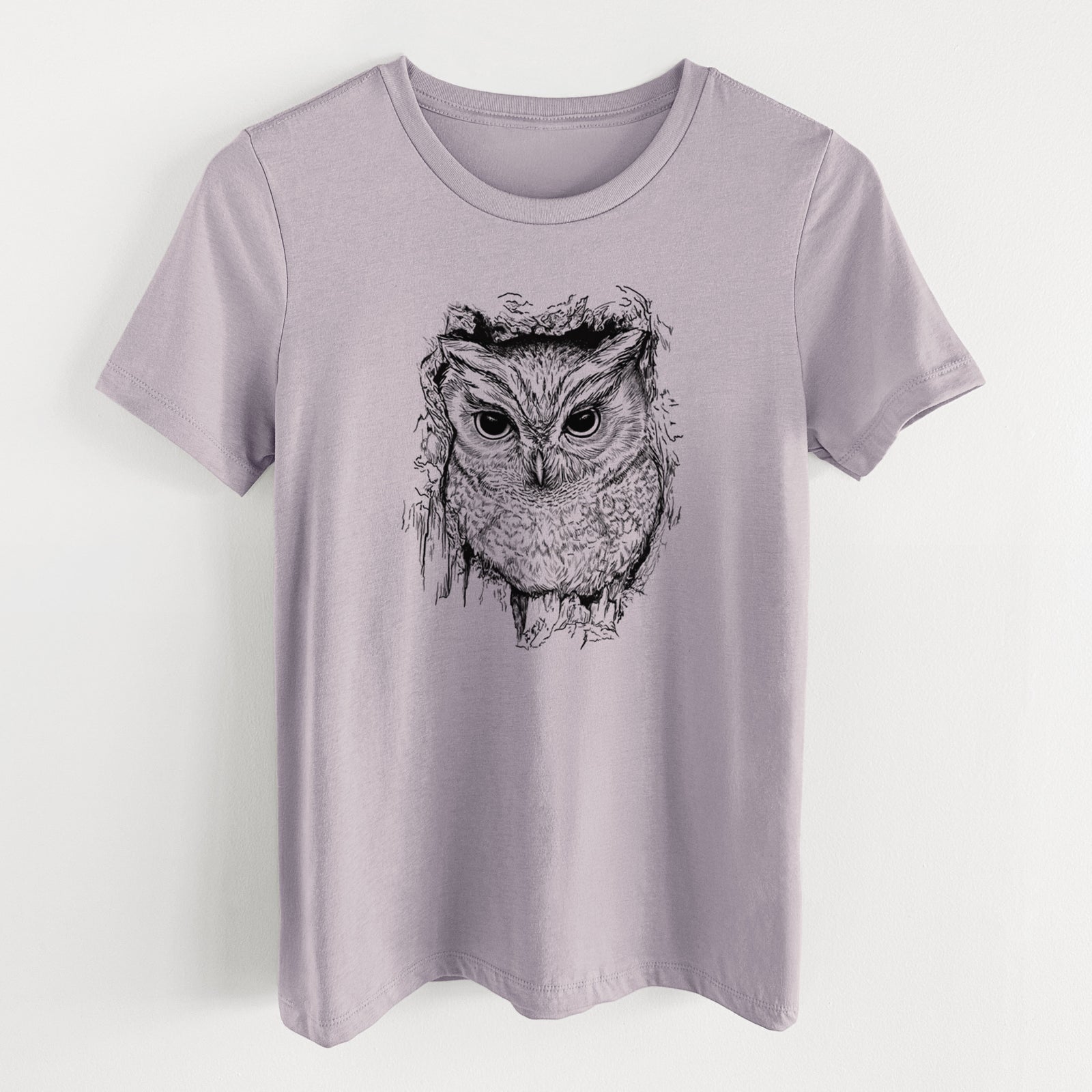 Light violet women's relaxed fit cotton t-shirt laid flat, printed with a detailed black ink portrait of an eastern screech owl with its ear tufts raised.