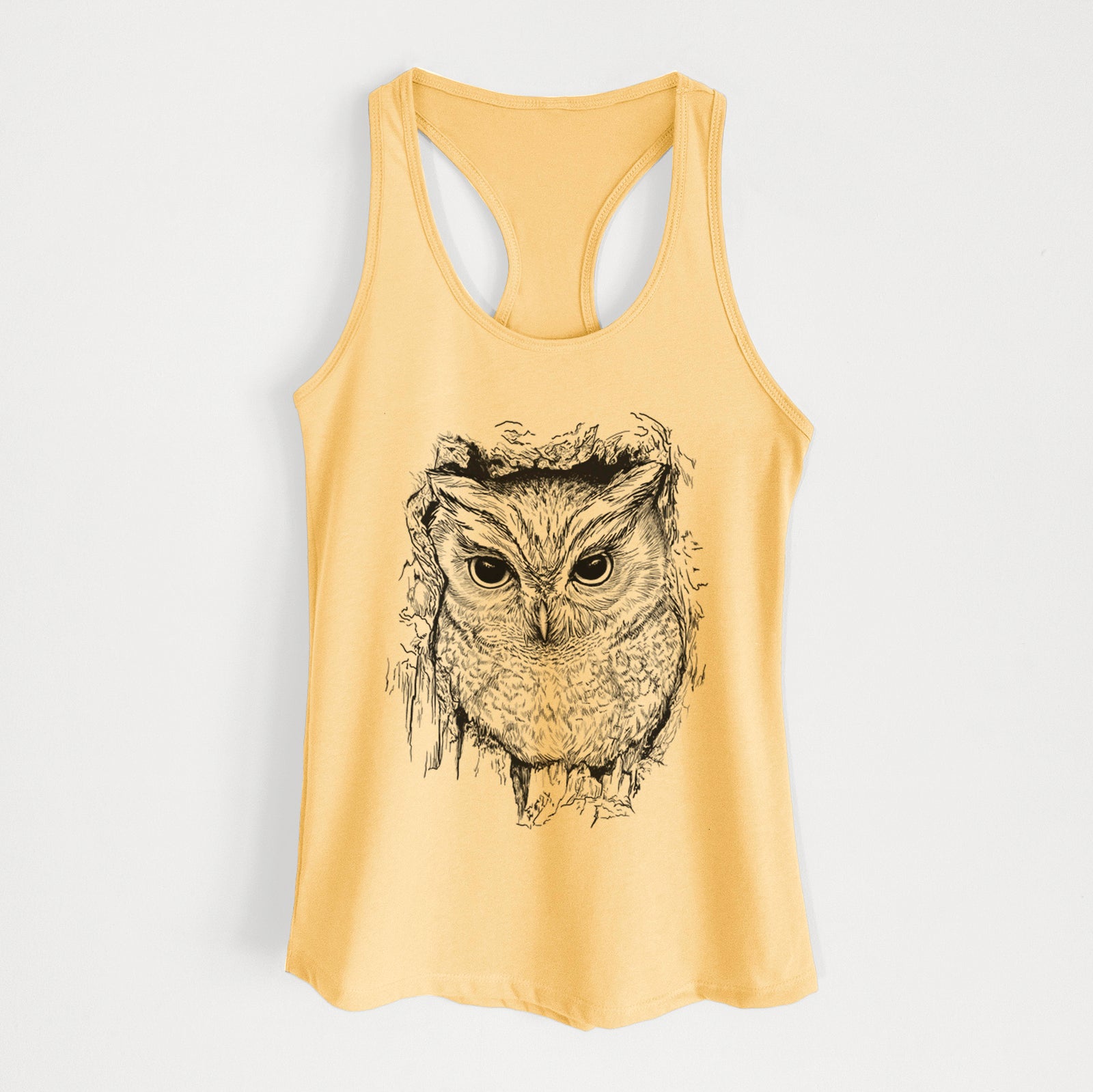 Banana cream women's racerback tank top laid flat, printed with a detailed black ink portrait of an eastern screech owl with its ear tufts raised.