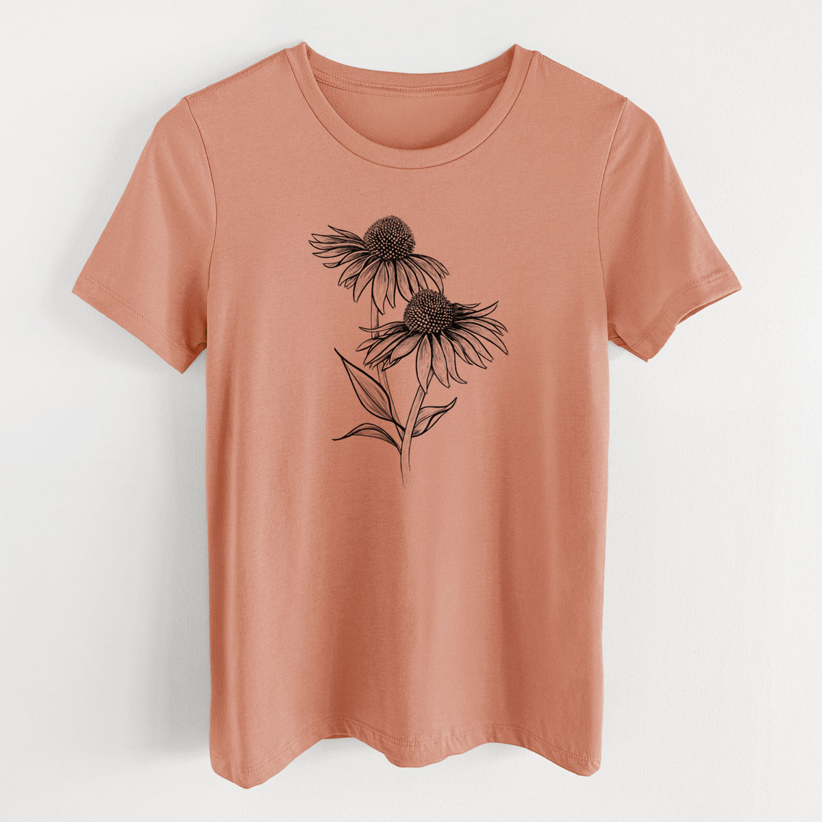 Terracotta orange women's relaxed fit cotton t-shirt laid flat, printed with a black ink line drawing of two coneflowers on tall stems.