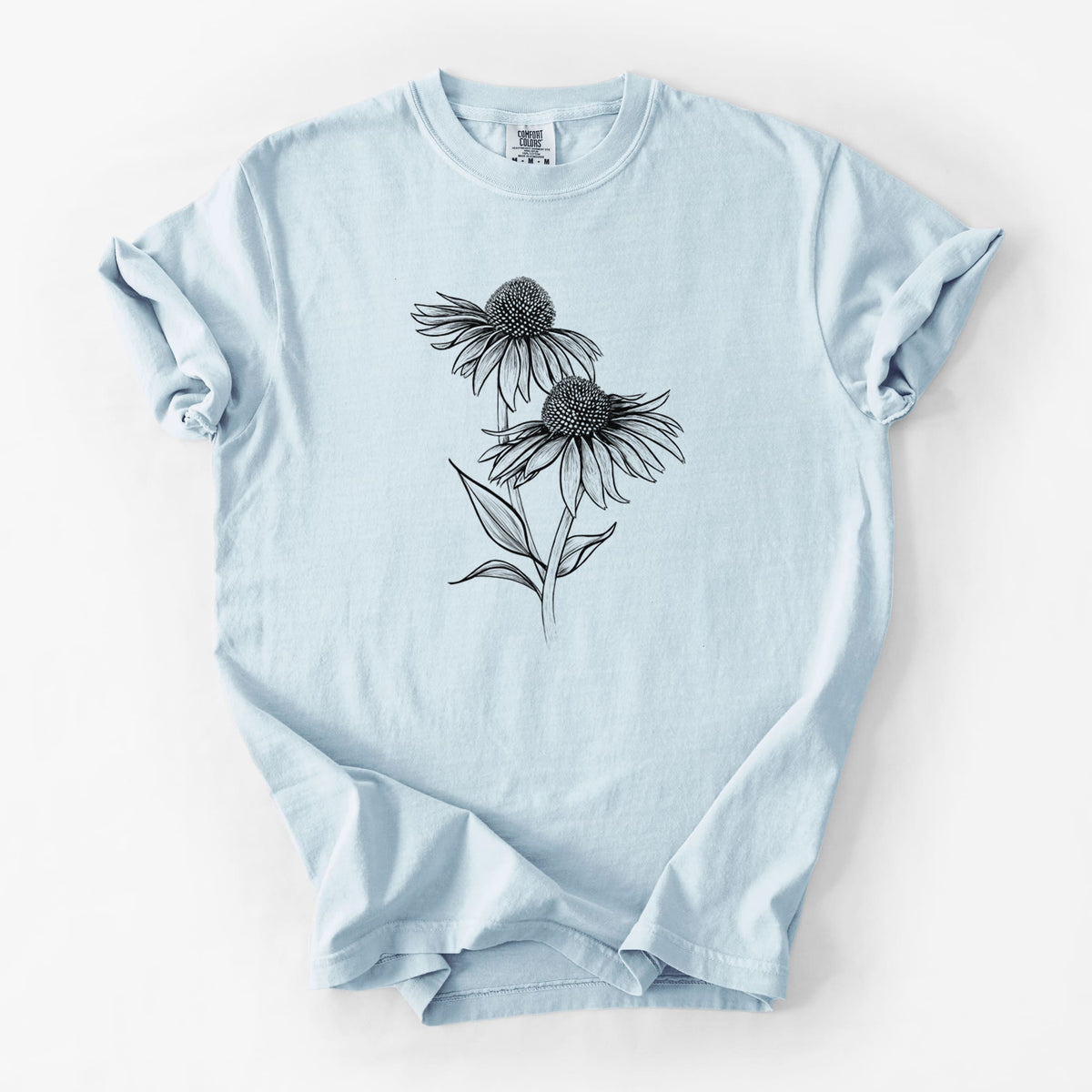 Chambray blue Comfort Colors t-shirt laid flat, printed with a black ink line drawing of two coneflowers on tall stems.