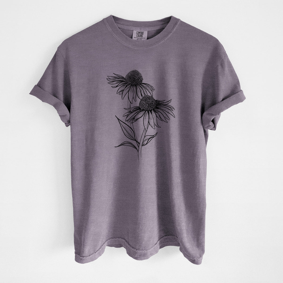 Wine red Comfort Colors t-shirt laid flat, printed with a black ink line drawing of two coneflowers on tall stems.