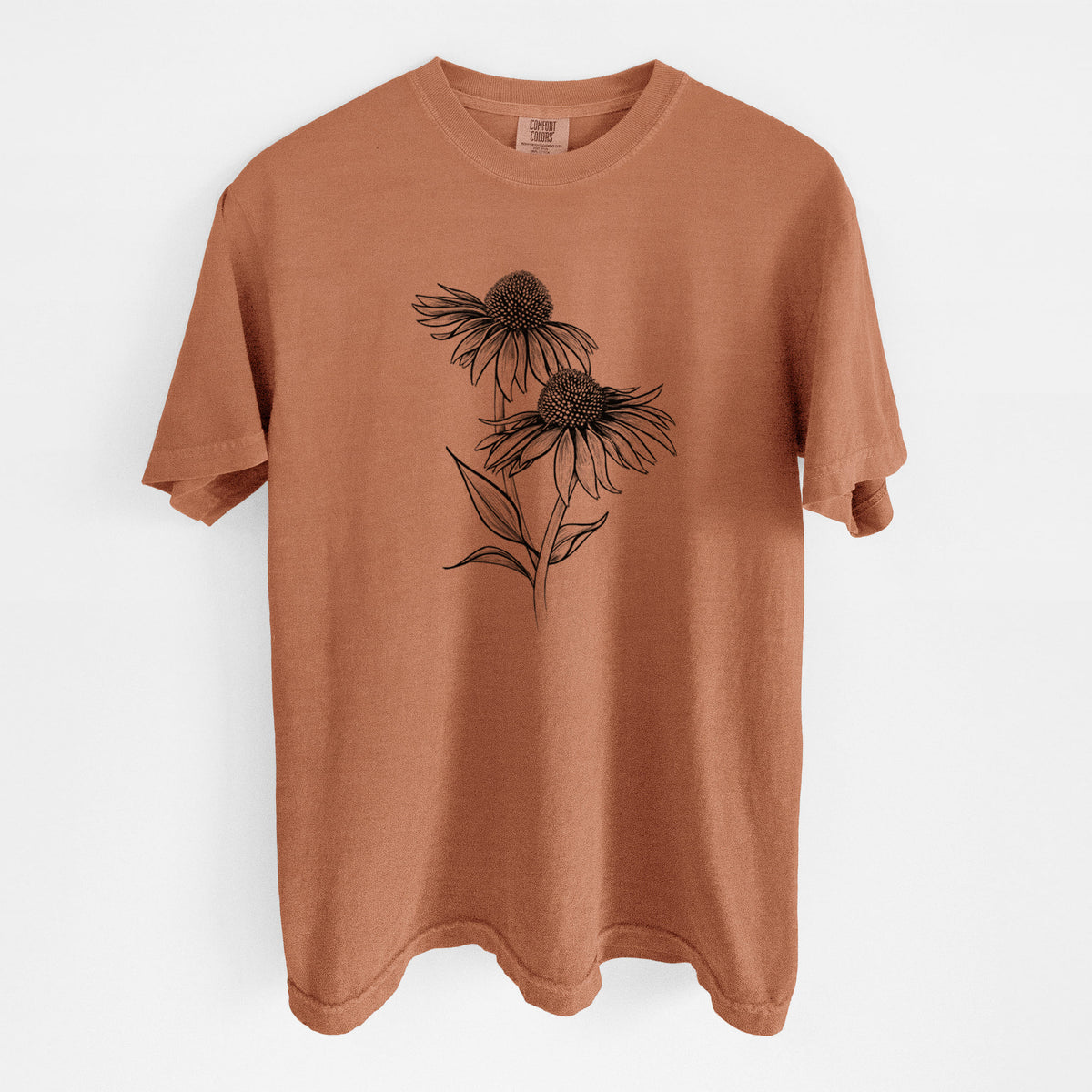 Yam burnt orange Comfort Colors t-shirt laid flat, printed with a black ink line drawing of two coneflowers on tall stems.