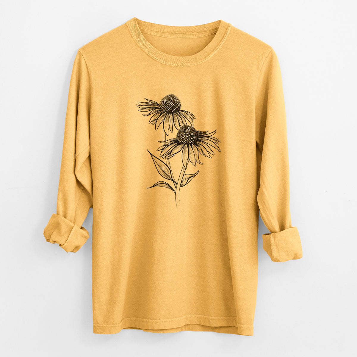 Golden wheat yellow Comfort Colors long sleeve shirt laid flat with the cuffs rolled, printed with a black ink line drawing of two coneflowers on tall stems.