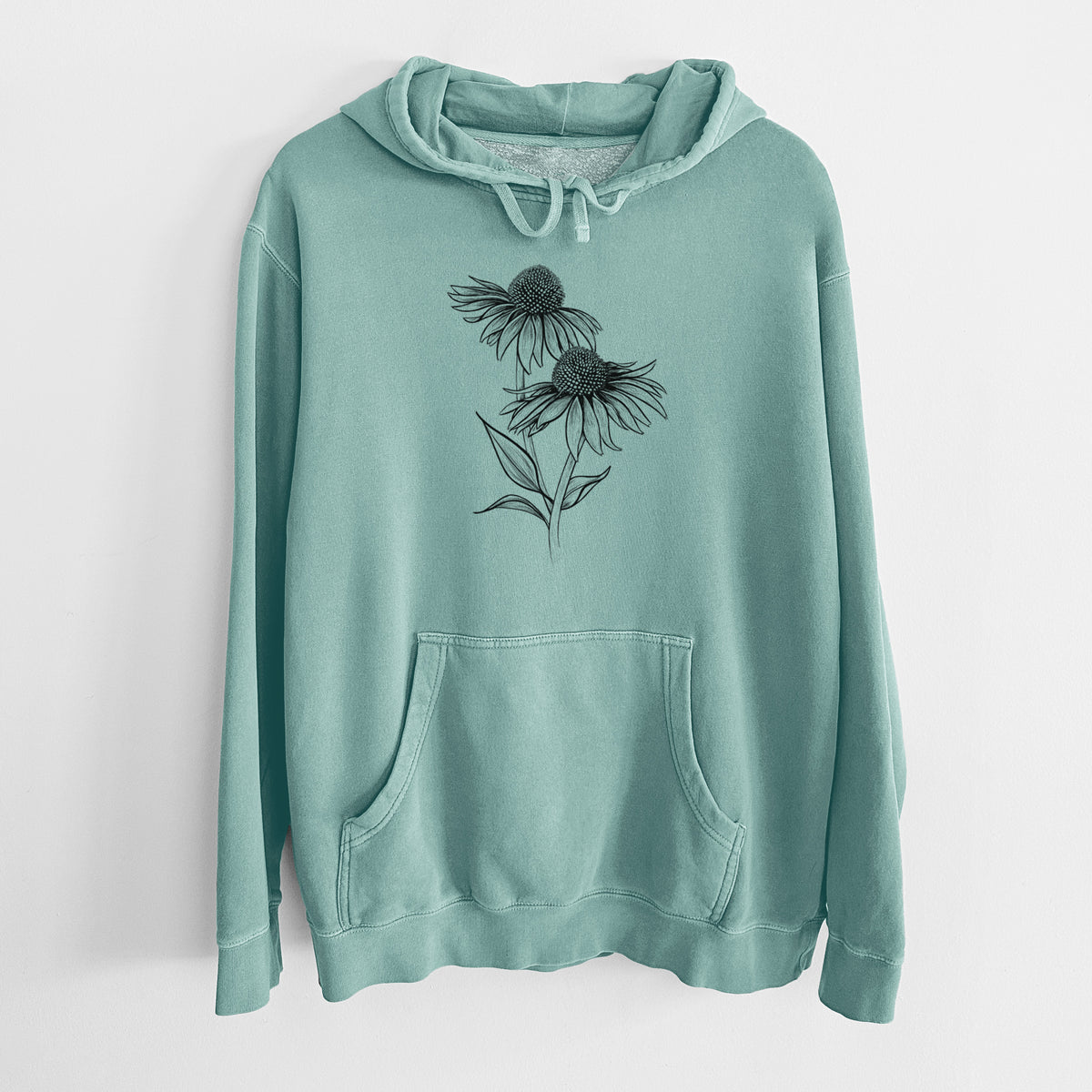 Mint green pigment dyed hoodie laid flat, printed with a black ink line drawing of two coneflowers on tall stems.