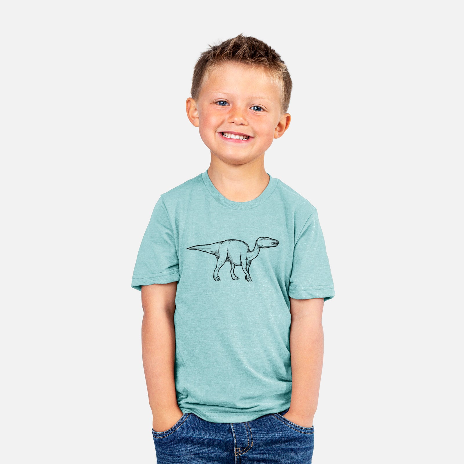 Two youth t-shirts in different colors on hangers, printed with a black ink illustration of an Edmontosaurus walking.