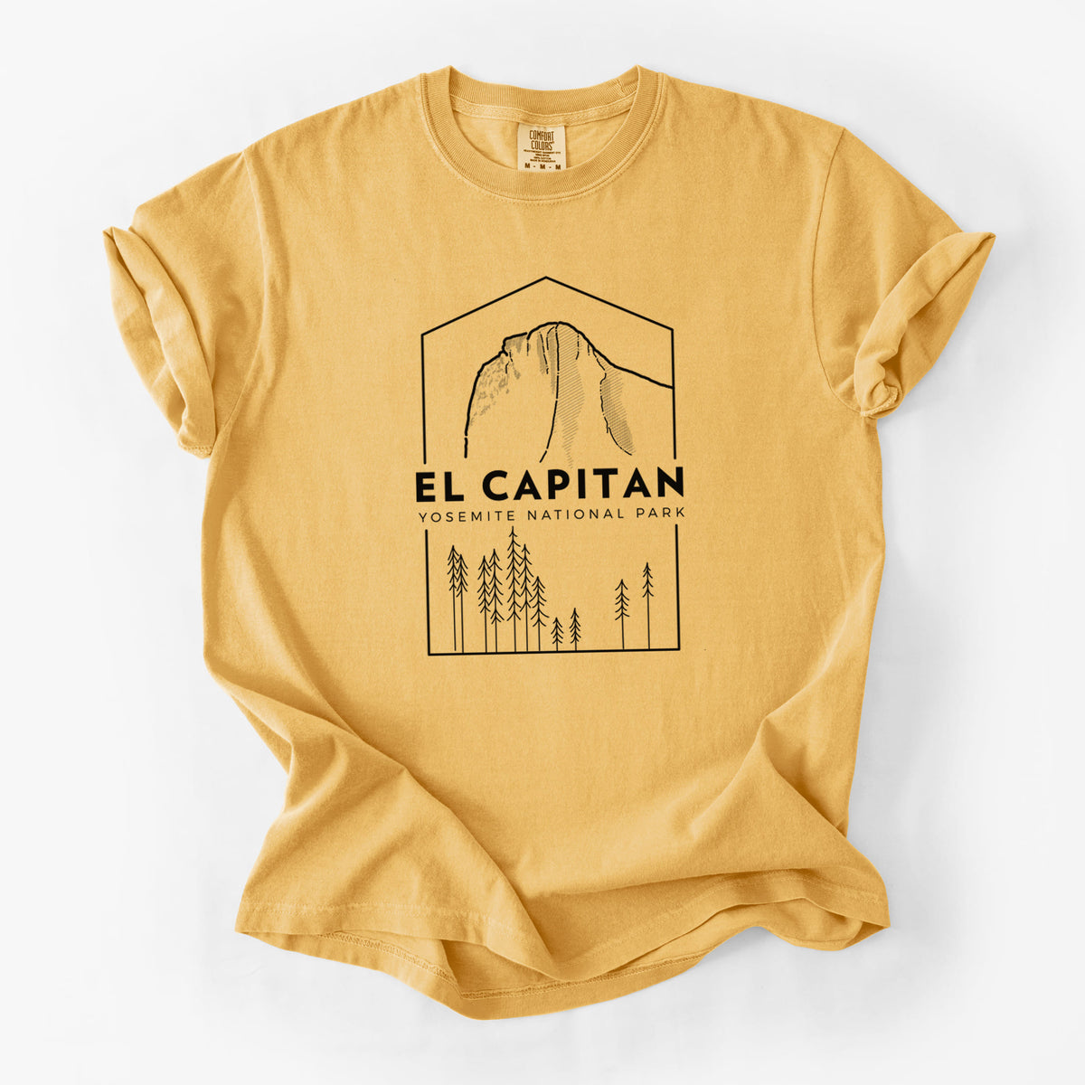 Golden wheat yellow Comfort Colors t-shirt laid flat, printed with a black line art badge of El Capitan rising above a pine forest, with the words El Capitan, Yosemite National Park.