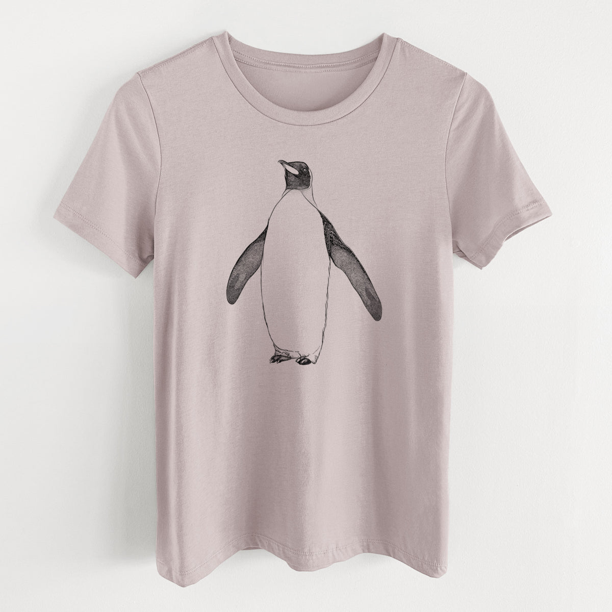 Pink gravel women's relaxed fit cotton t-shirt laid flat, printed with a black ink illustration of an emperor penguin standing.