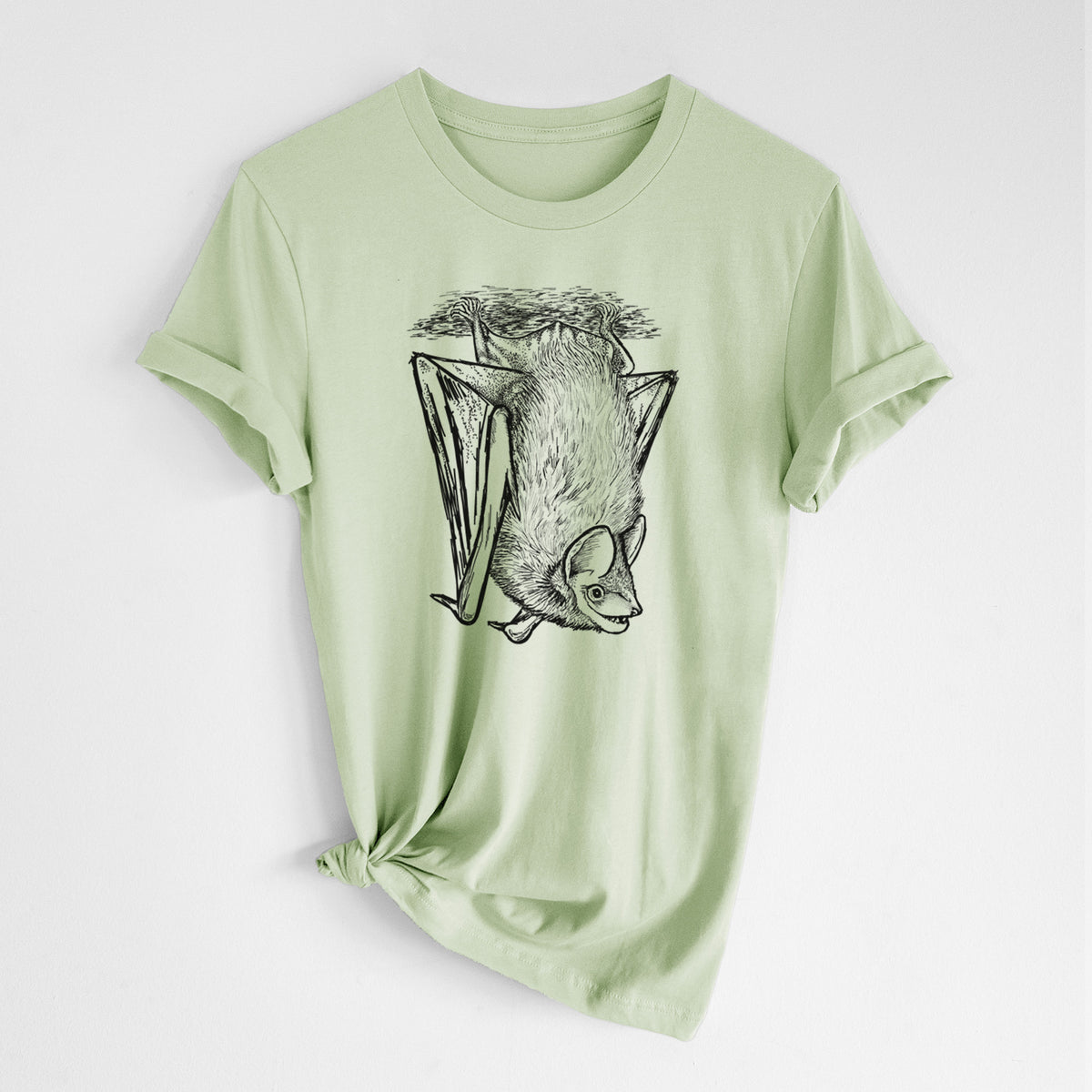 Spring green lightweight cotton t-shirt laid flat with the sleeves rolled, printed with a detailed black ink illustration of a big brown bat hanging upside down.