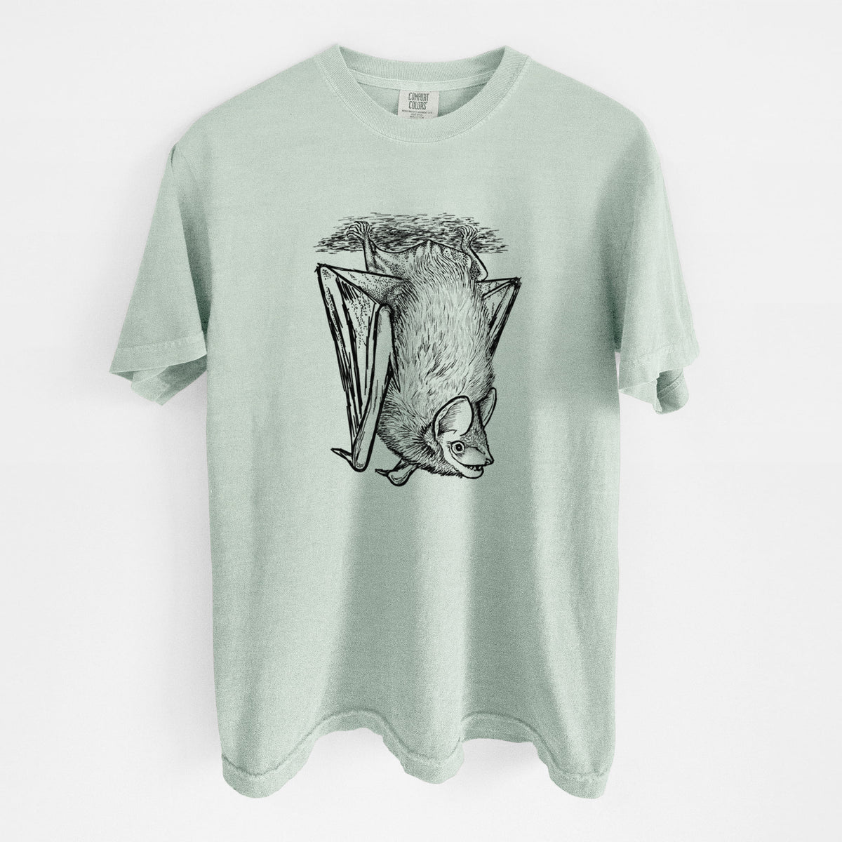 Bay green Comfort Colors t-shirt laid flat, printed with a detailed black ink illustration of a big brown bat hanging upside down.