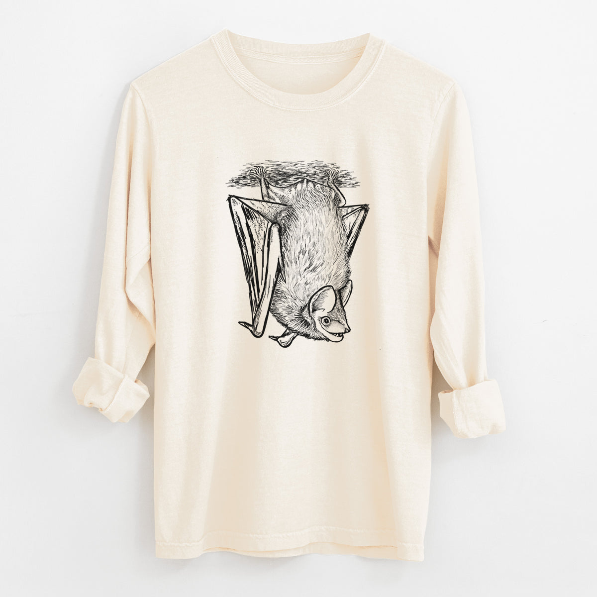 Ivory Comfort Colors long sleeve shirt laid flat with the cuffs rolled, printed with a detailed black ink illustration of a big brown bat hanging upside down.