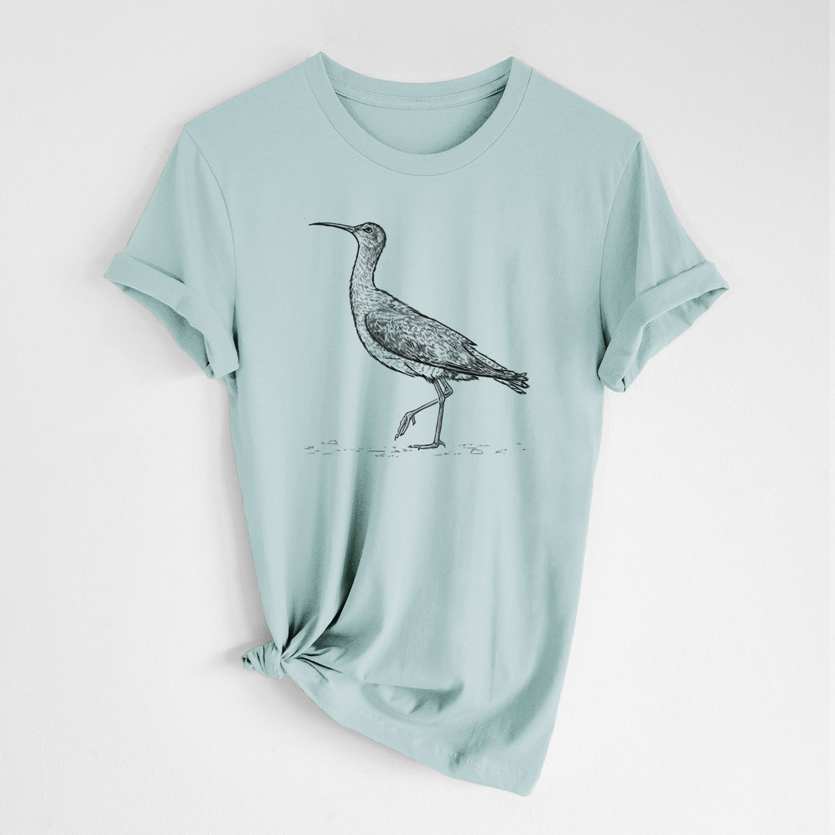 Dusty blue lightweight cotton t-shirt laid flat with the sleeves rolled, printed with a detailed black ink illustration of an Eskimo curlew with its long curved bill, walking.