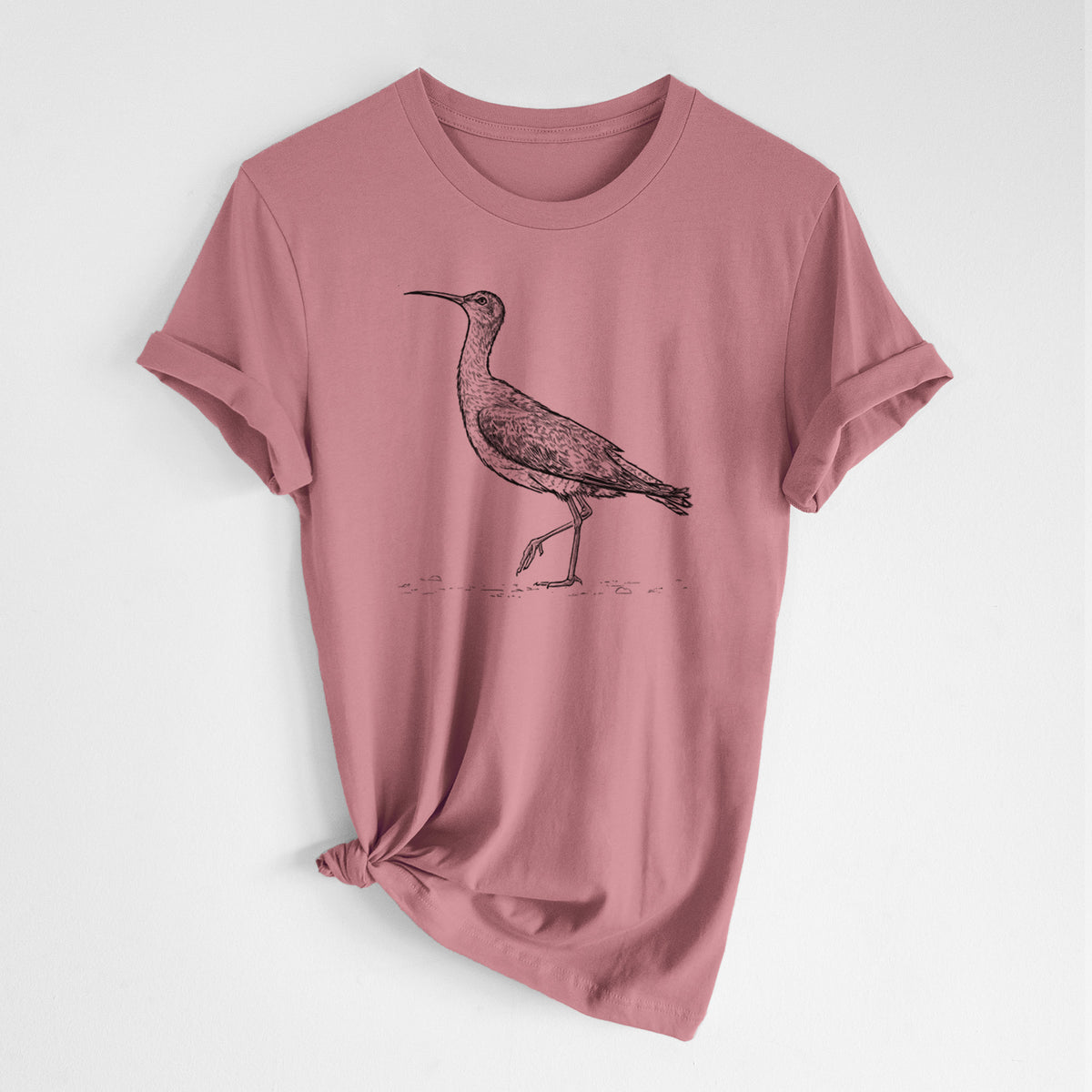 Mauve pink lightweight cotton t-shirt laid flat with the sleeves rolled, printed with a detailed black ink illustration of an Eskimo curlew with its long curved bill, walking.