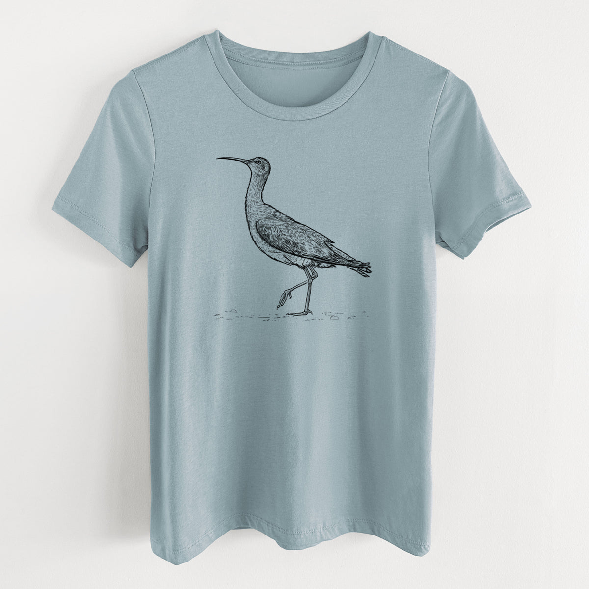 Vintage denim women's relaxed fit cotton t-shirt laid flat, printed with a detailed black ink illustration of an Eskimo curlew with its long curved bill, walking.