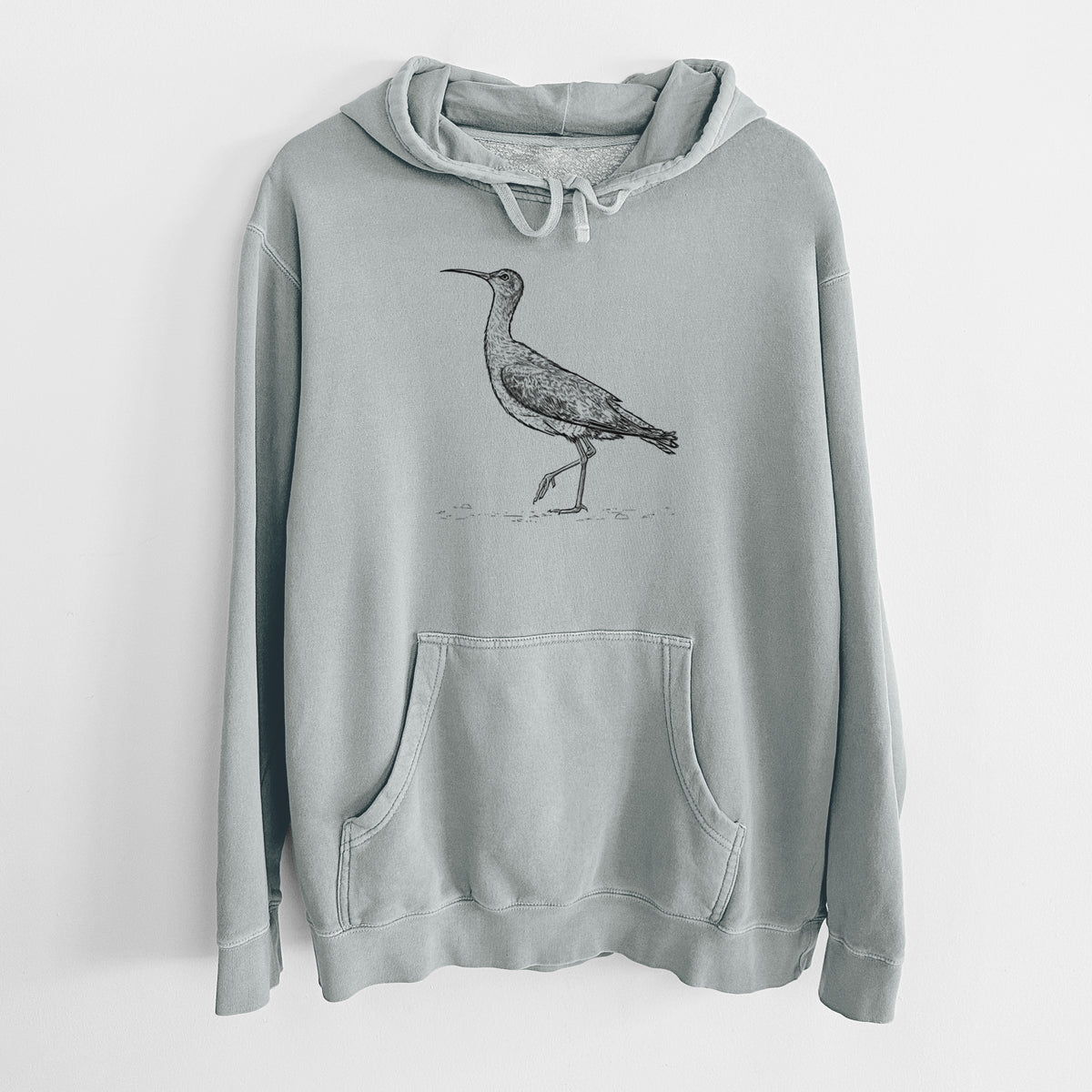 Sage green pigment dyed hoodie laid flat, printed with a detailed black ink illustration of an Eskimo curlew with its long curved bill, walking.