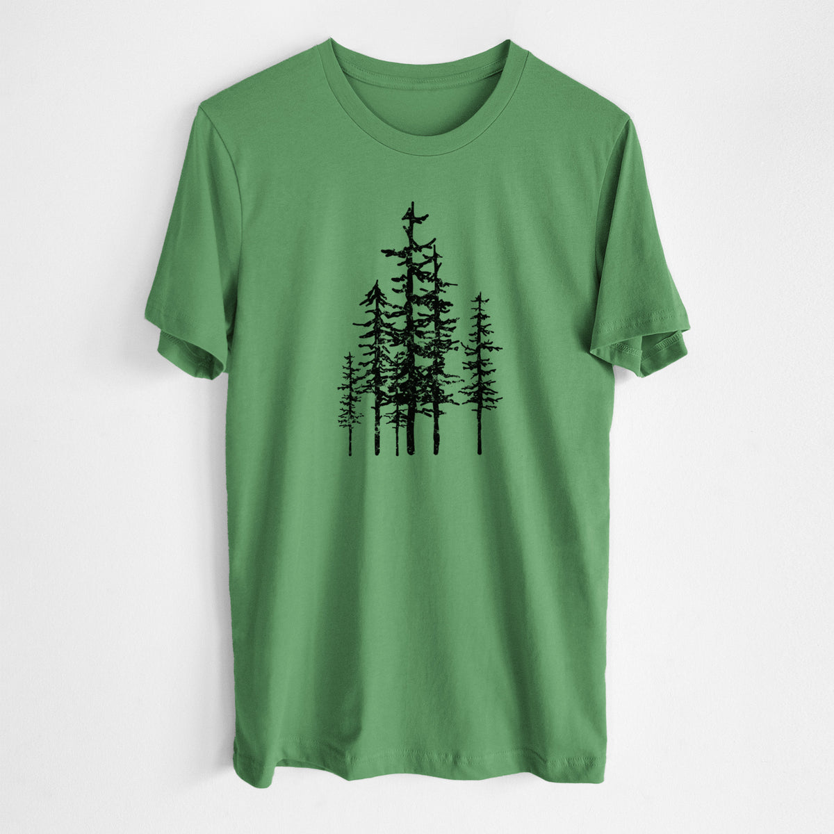 Leaf green lightweight cotton t-shirt laid flat, printed with a black ink illustration of a cluster of evergreen trees of varying heights.