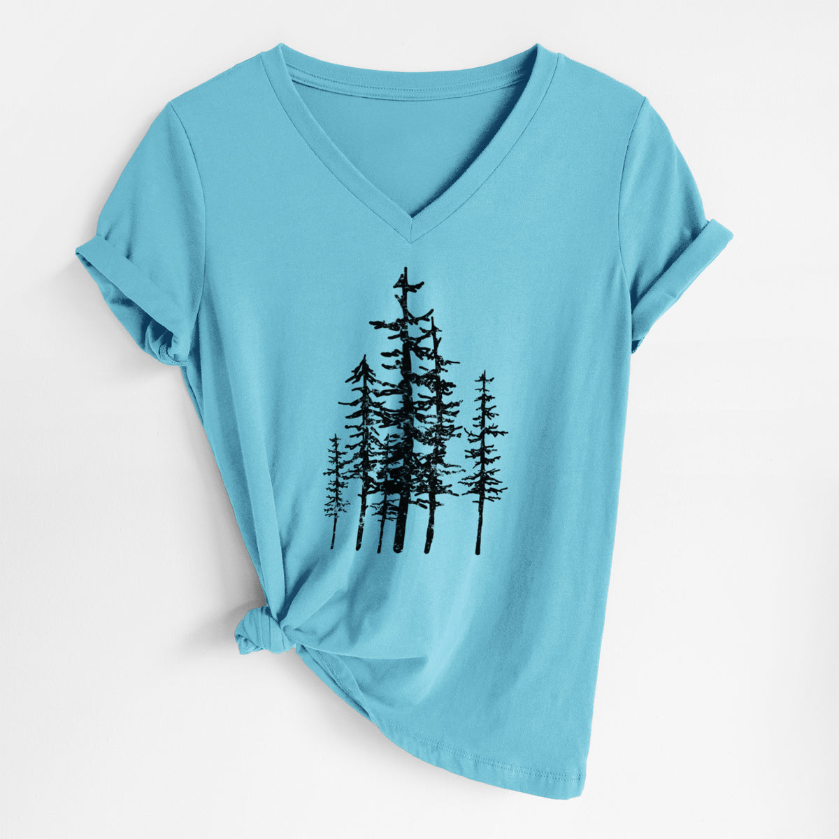 Turquoise women's relaxed fit cotton V-neck t-shirt laid flat, printed with a black ink illustration of a cluster of evergreen trees of varying heights.