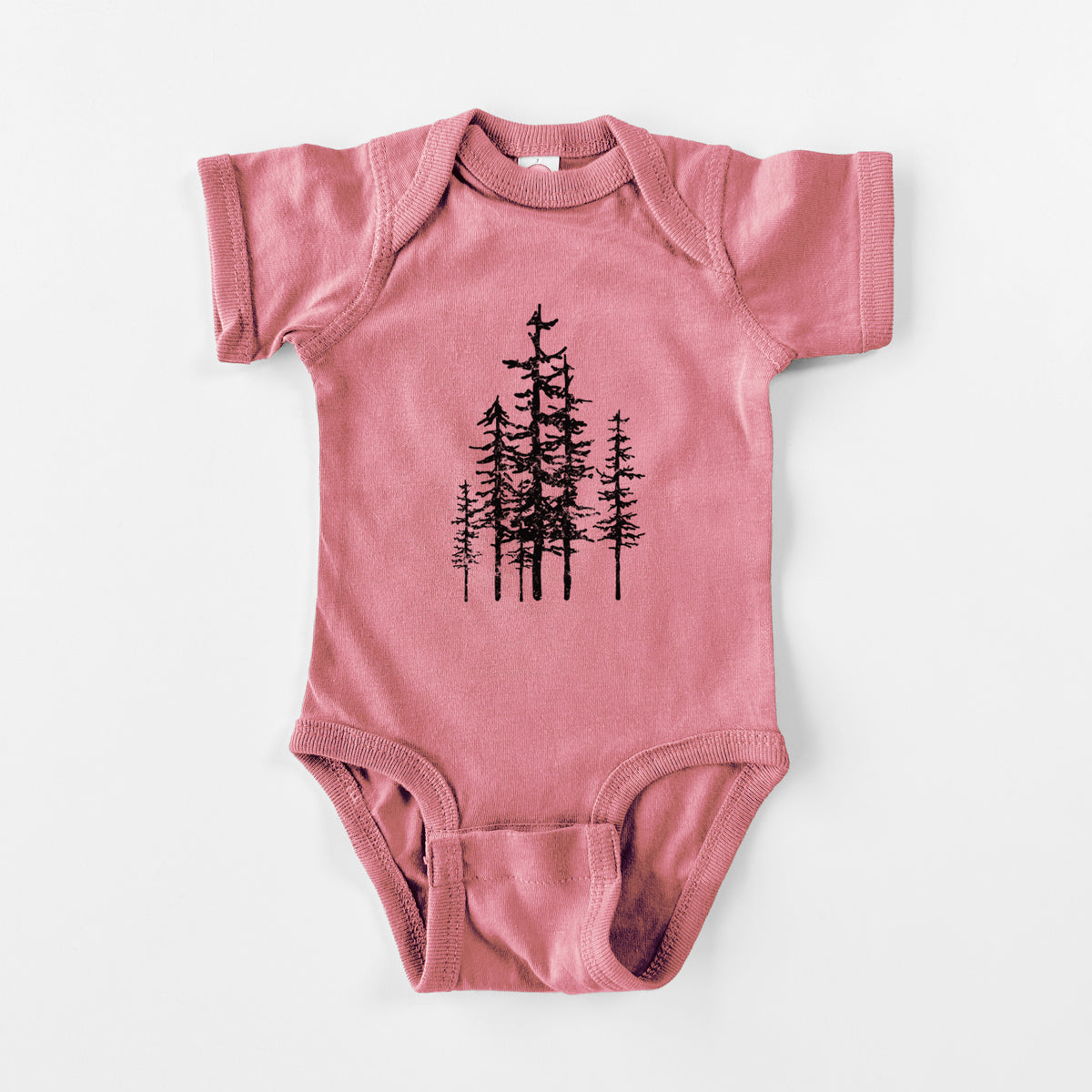 Mauve pink baby bodysuit laid flat, printed with a black ink illustration of a cluster of evergreen trees of varying heights.