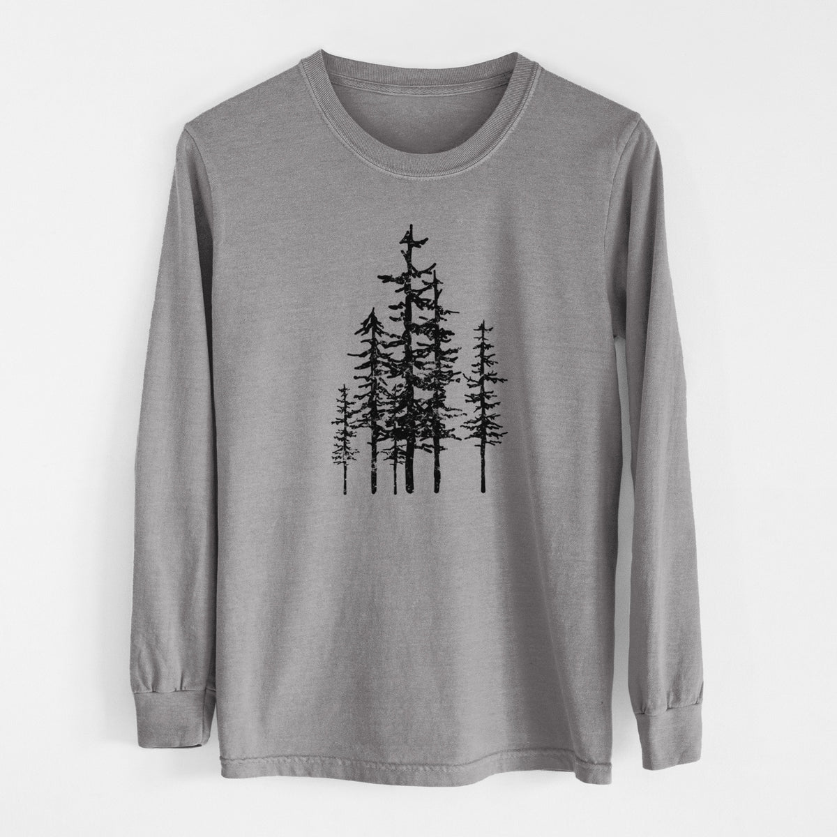 Grey Comfort Colors long sleeve shirt laid flat, printed with a black ink illustration of a cluster of evergreen trees of varying heights.