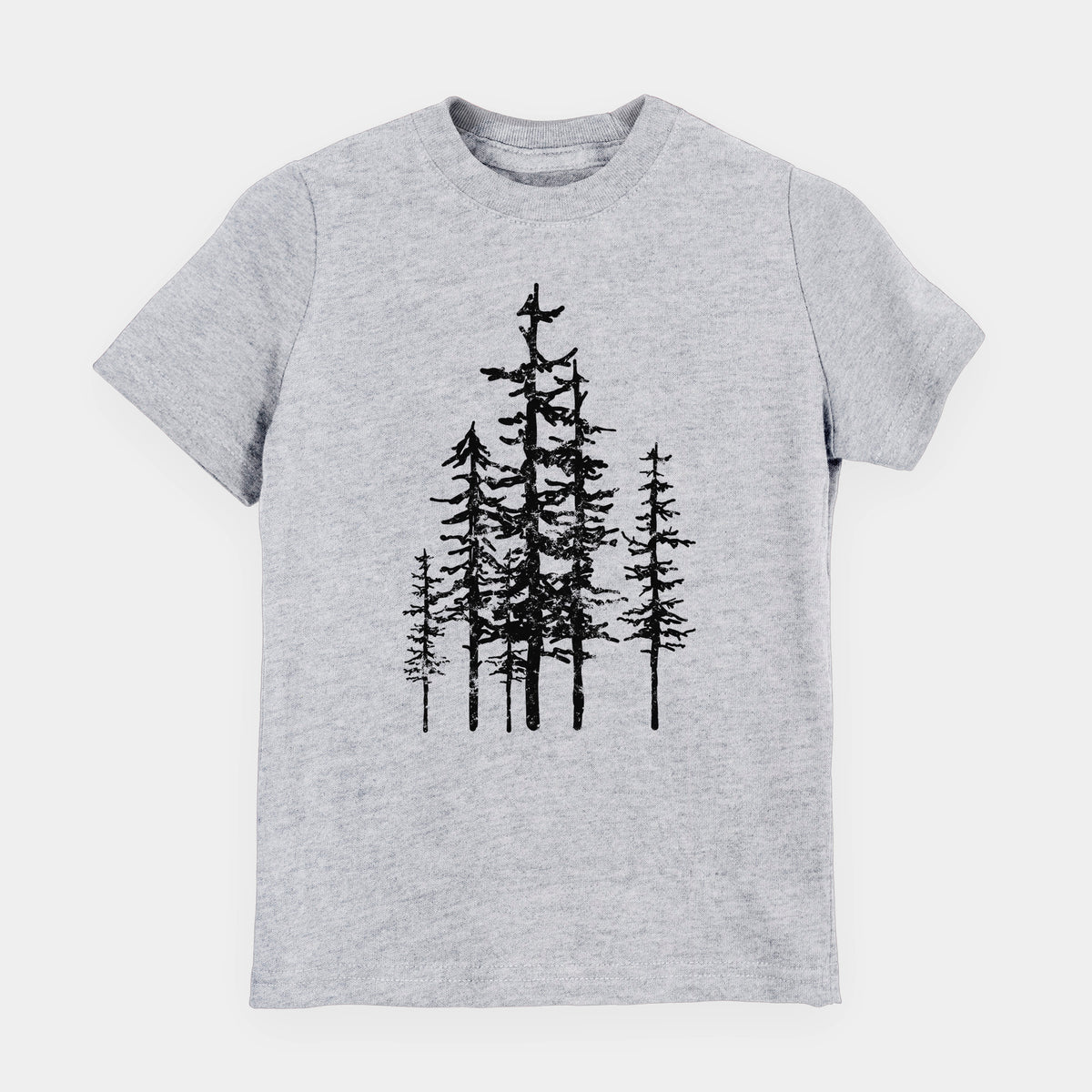 Heather grey youth t-shirt laid flat, printed with a black ink illustration of a cluster of evergreen trees of varying heights.