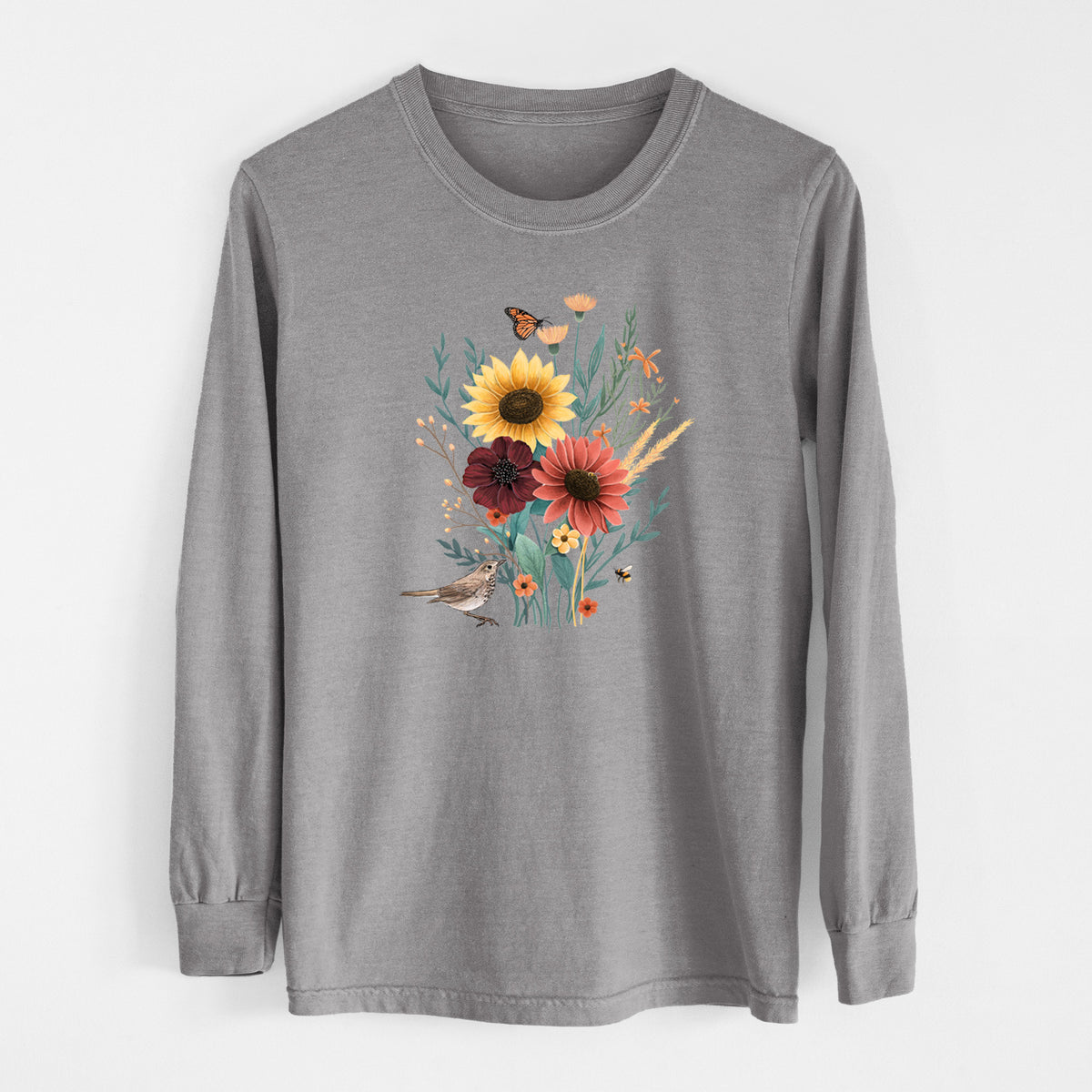 Grey Comfort Colors long sleeve shirt laid flat, printed with a full-color bouquet of sunflowers, red flowers and wildflowers with butterflies and a small bird.