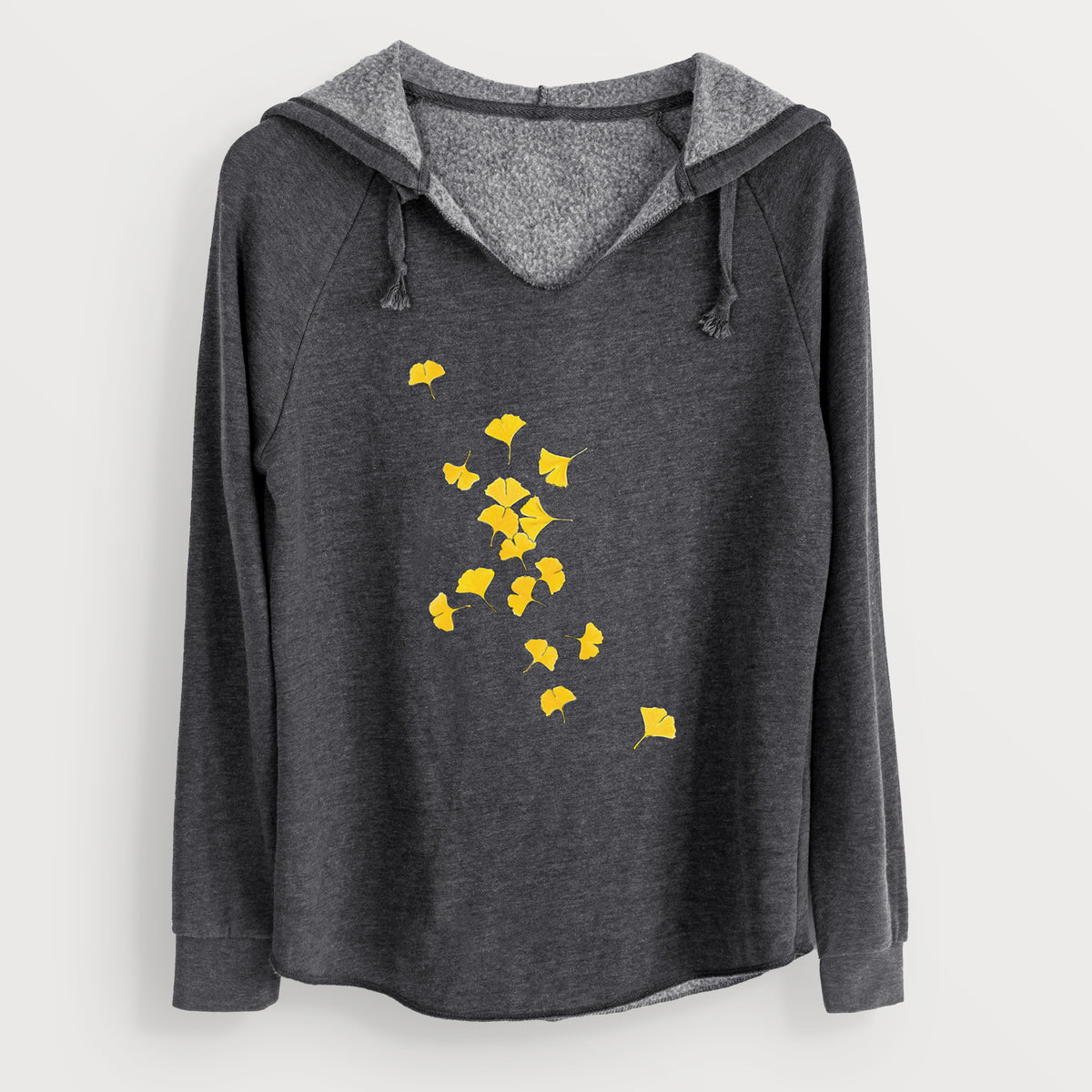Charcoal grey women's Cali Wave hooded sweatshirt laid flat, printed with a scatter of bright yellow fan-shaped ginkgo leaves falling.