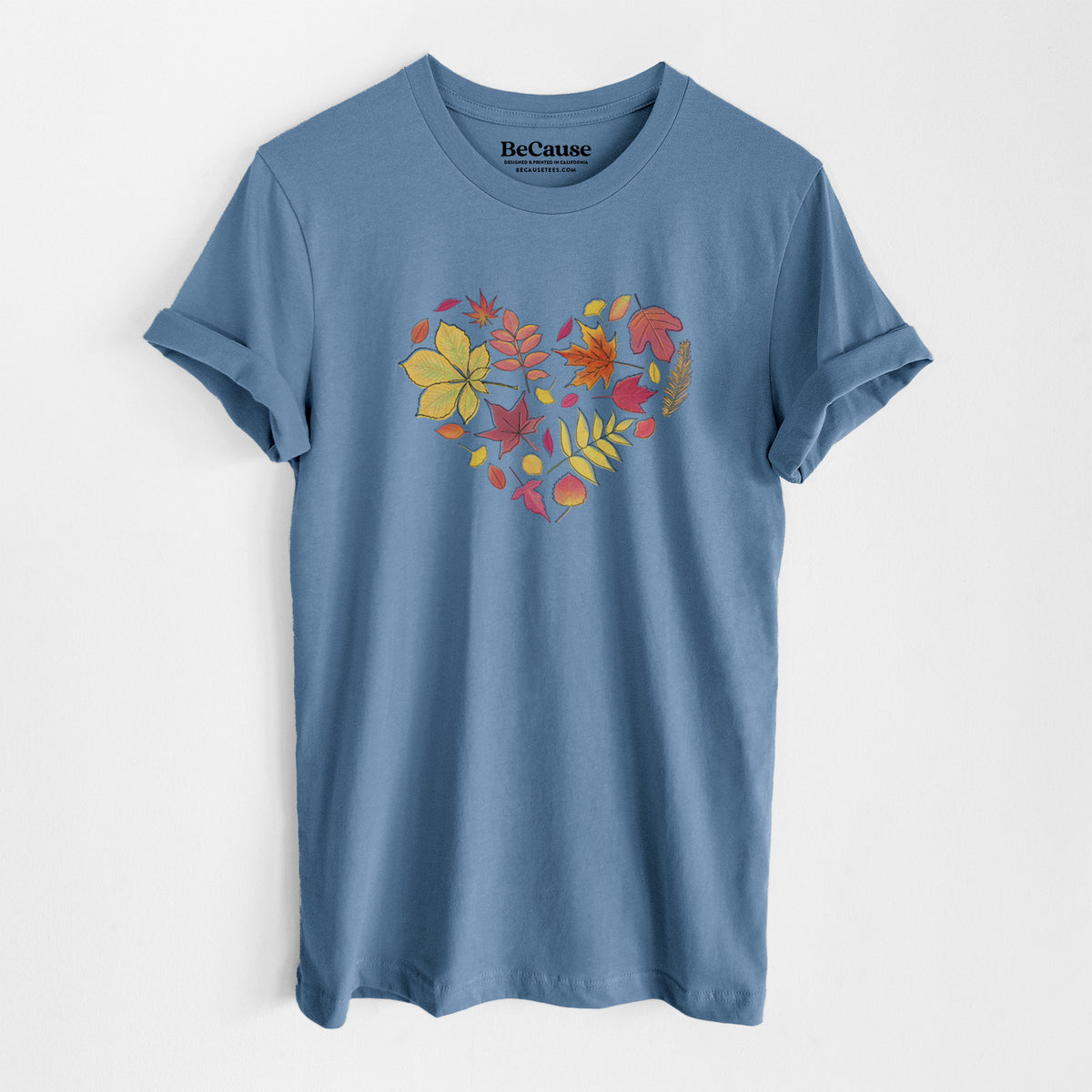 Steel blue lightweight cotton t-shirt laid flat, printed with a full-color heart shape made of autumn leaves in orange, red and yellow.