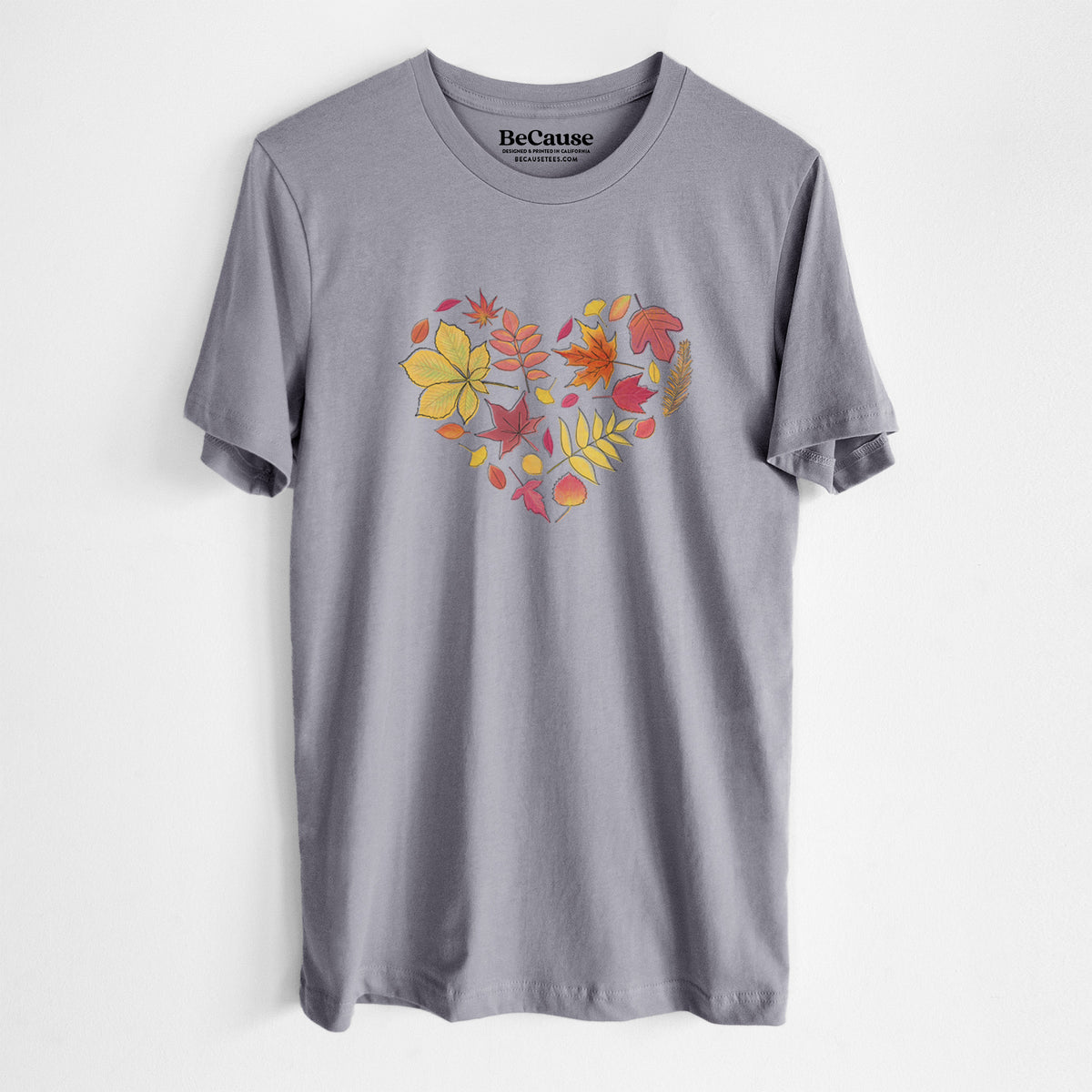 Storm grey lightweight cotton t-shirt laid flat, printed with a full-color heart shape made of autumn leaves in orange, red and yellow.