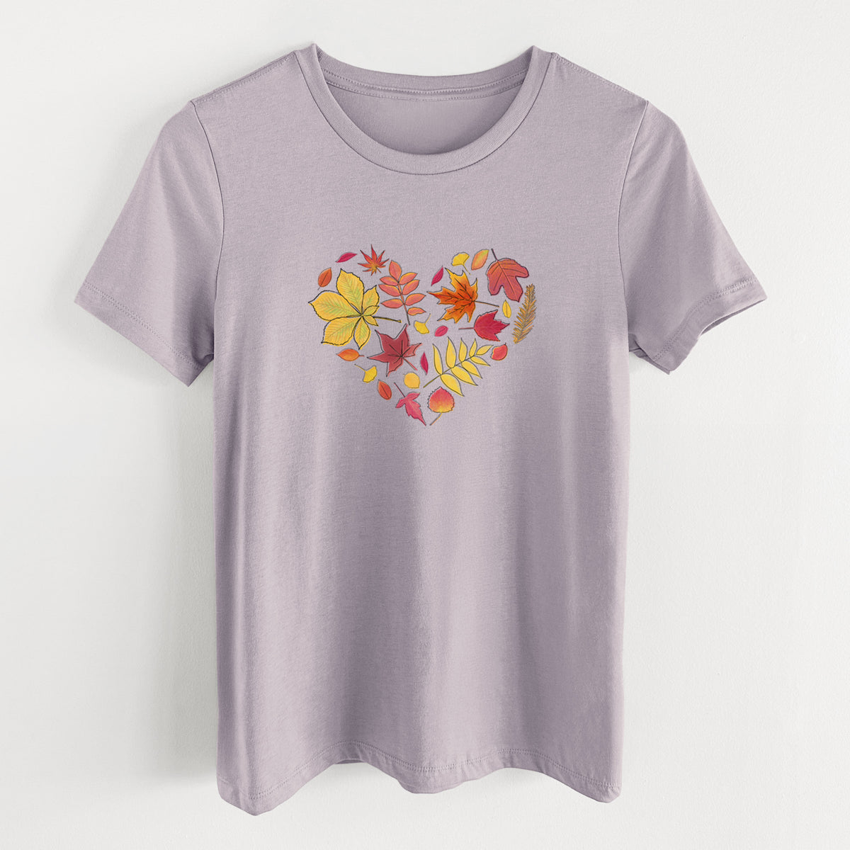 Light violet women's relaxed fit cotton t-shirt laid flat, printed with a full-color heart shape made of autumn leaves in orange, red and yellow.