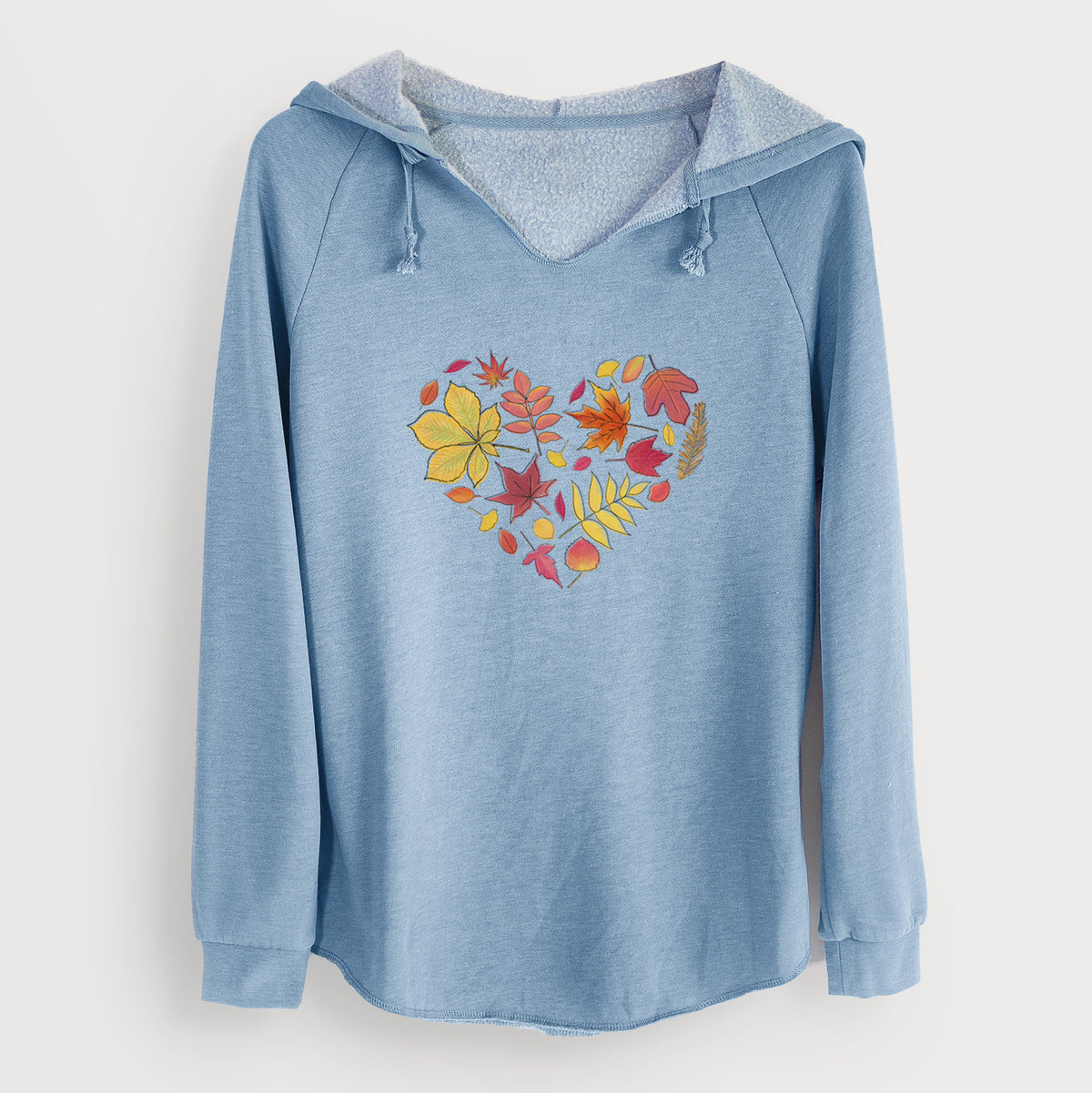 Misty blue women's Cali Wave hooded sweatshirt laid flat, printed with a full-color heart shape made of autumn leaves in orange, red and yellow.