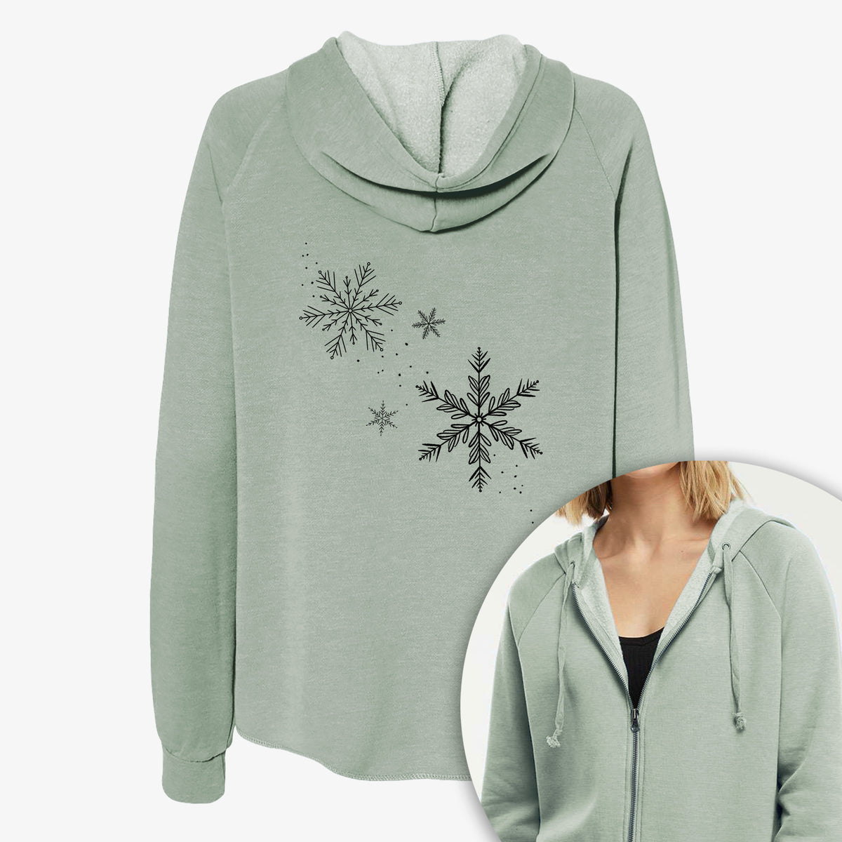 Women's Cali Wave zip-up sweatshirt printed with delicate snowflakes of different sizes falling, with a close-up of the zipper.