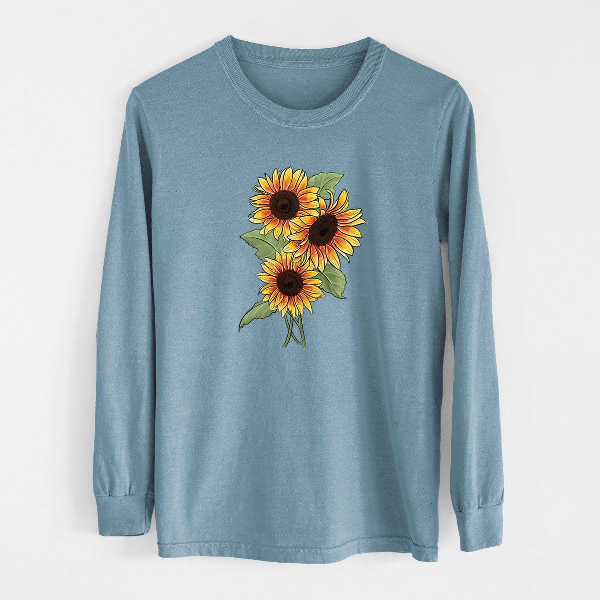 Steel blue Comfort Colors long sleeve shirt laid flat, printed with a full-color illustration of a bunch of yellow and orange sunflowers.