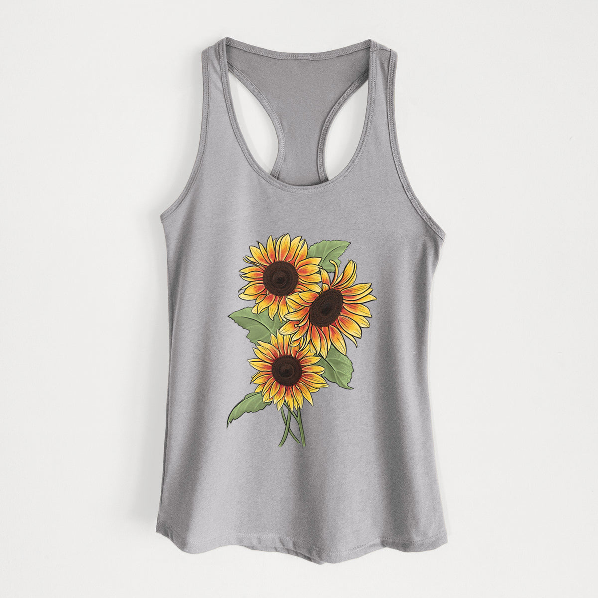 Heather grey women's racerback tank top laid flat, printed with a full-color illustration of a bunch of yellow and orange sunflowers.