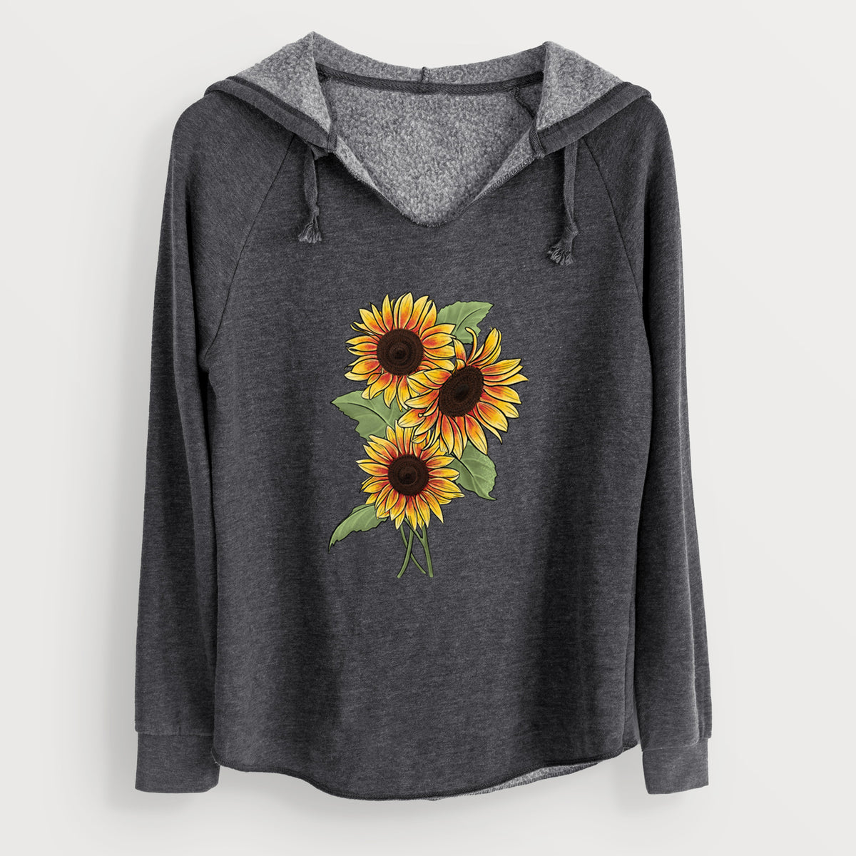 Charcoal grey women's Cali Wave hooded sweatshirt laid flat, printed with a full-color illustration of a bunch of yellow and orange sunflowers.