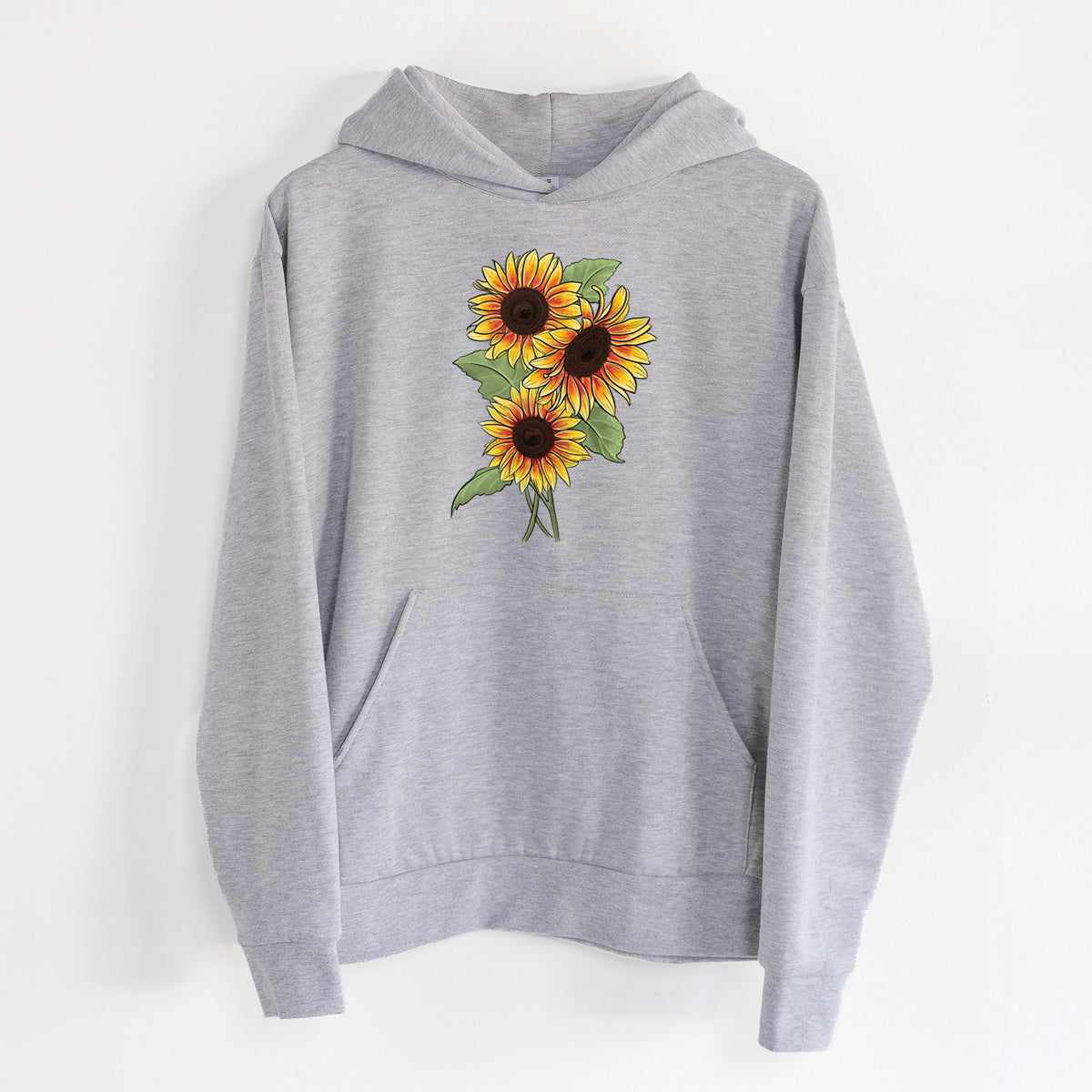 Firecracker Sunflowers - Helianthus annuus - Statement Midweight Hoodie in Heather Grey, hanging on a white wall, with a front kangaroo pocket and no drawcords.