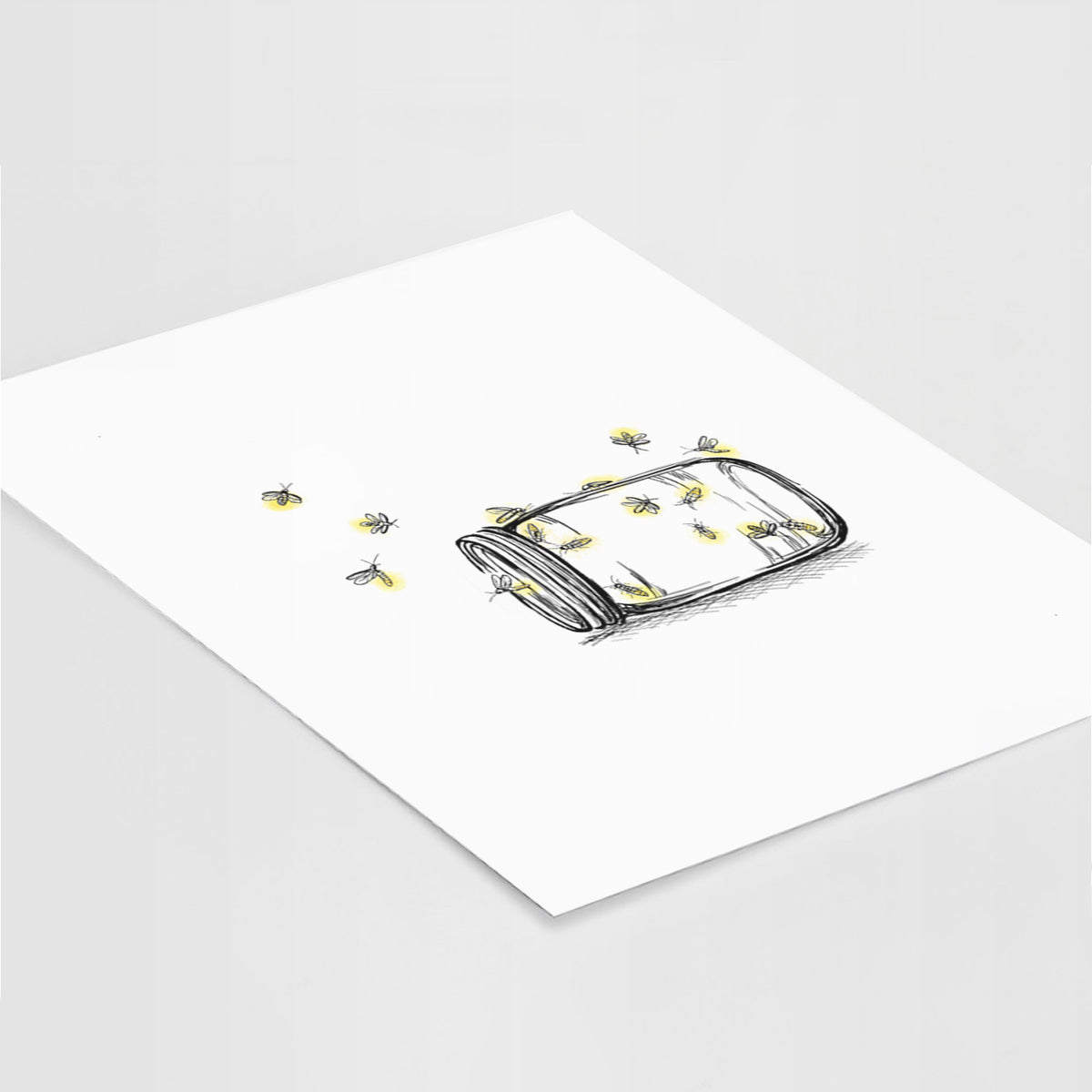 Art print of a mason jar with glowing yellow fireflies flying out of it, lying at an angle on a white surface.