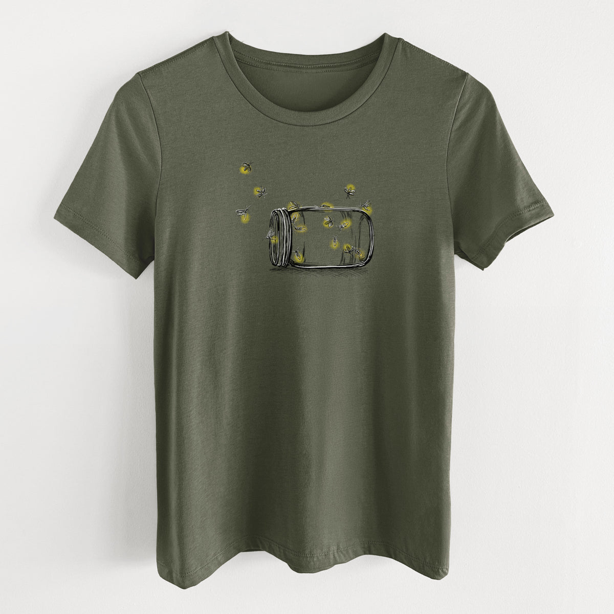 Military green women's relaxed fit cotton t-shirt laid flat, printed with a mason jar with glowing yellow fireflies flying out of it.