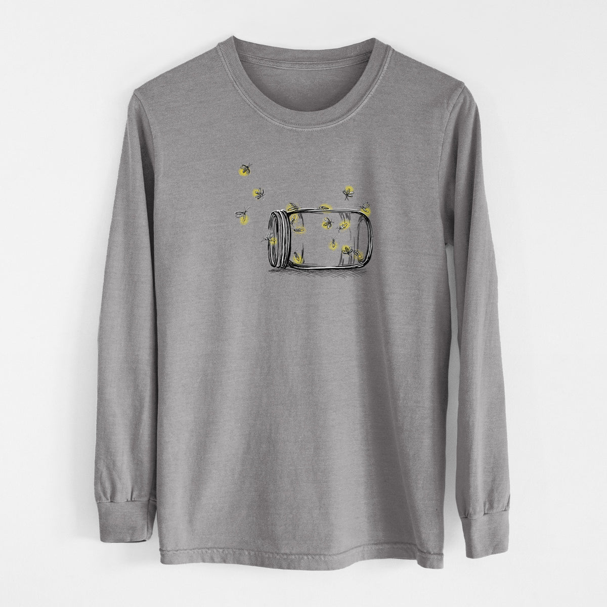 Grey Comfort Colors long sleeve shirt laid flat, printed with a mason jar with glowing yellow fireflies flying out of it.