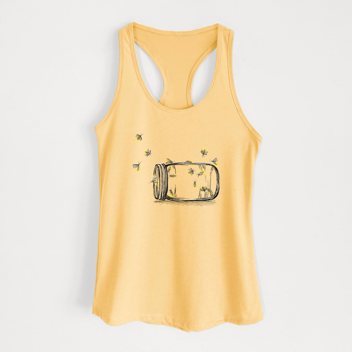 Banana cream women's racerback tank top laid flat, printed with a mason jar with glowing yellow fireflies flying out of it.