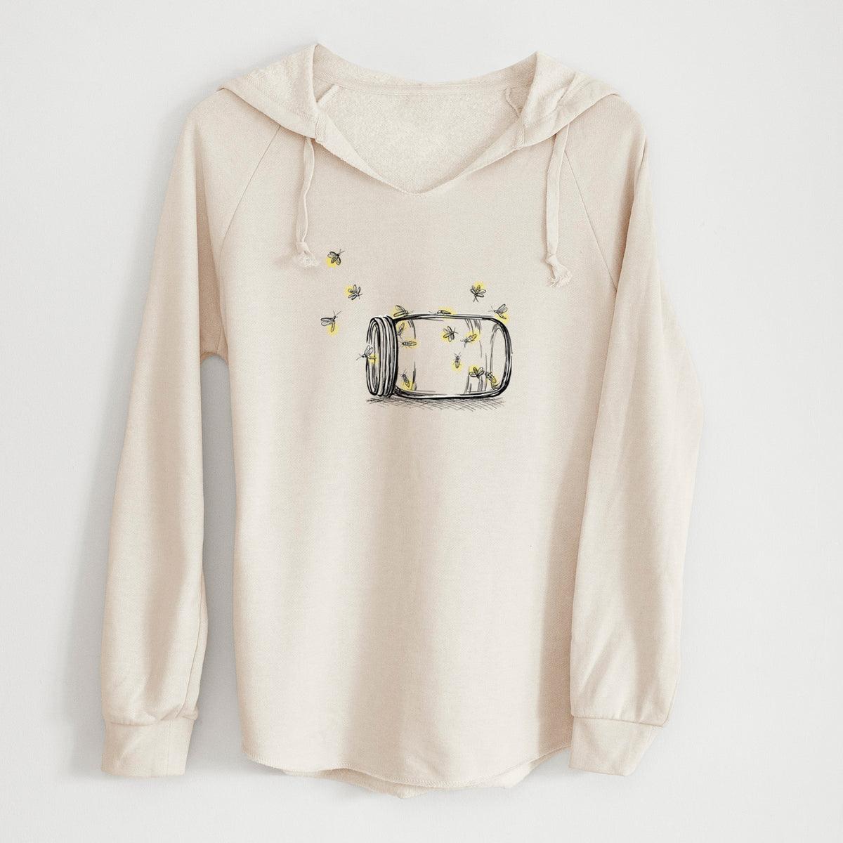 Bone cream women's Cali Wave hooded sweatshirt laid flat, printed with a mason jar with glowing yellow fireflies flying out of it.